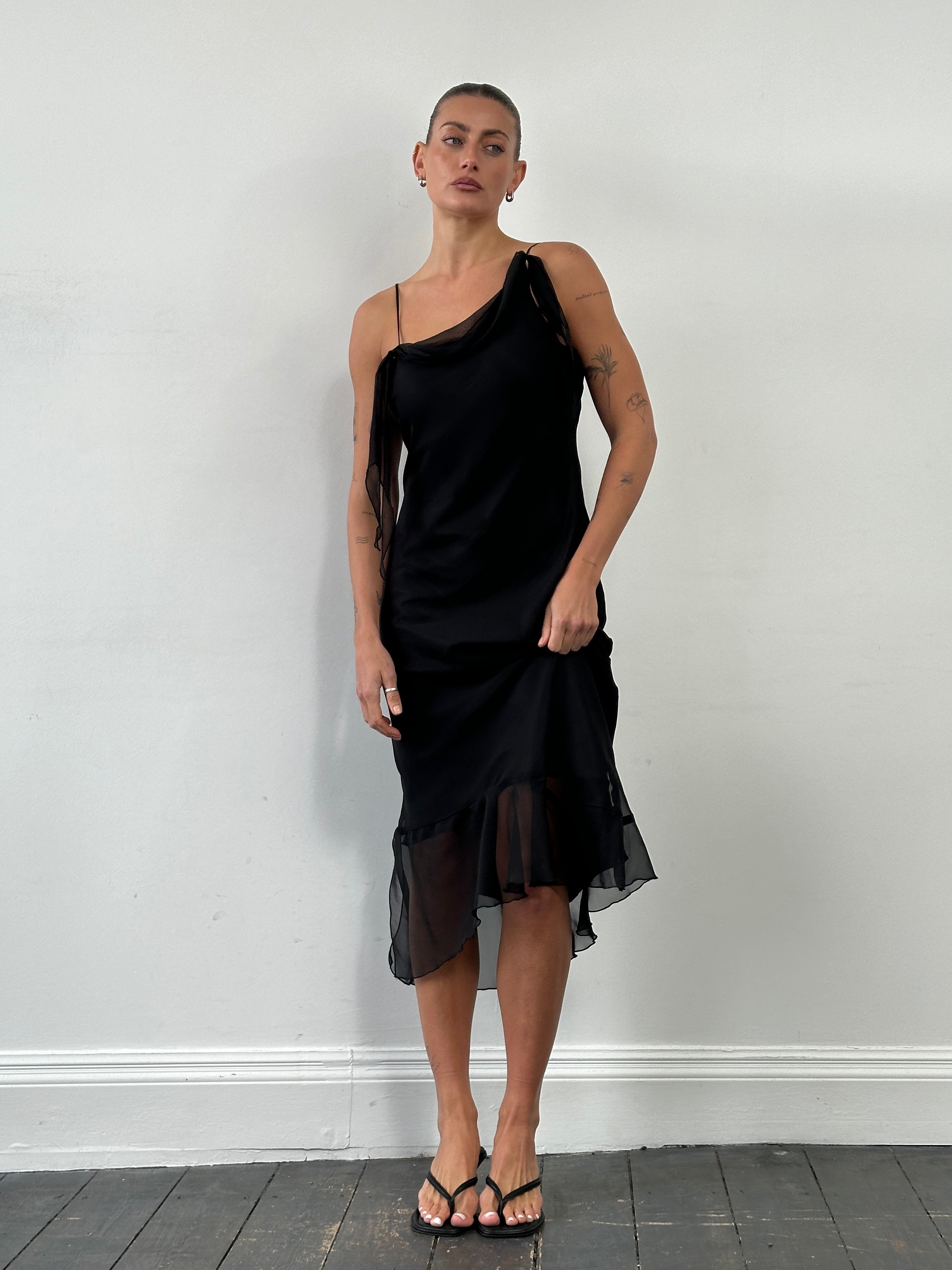 Vintage asymmetric sheer maxi slip dress, M size, featuring a flowing design and lightweight fabric, displayed on a hanger.