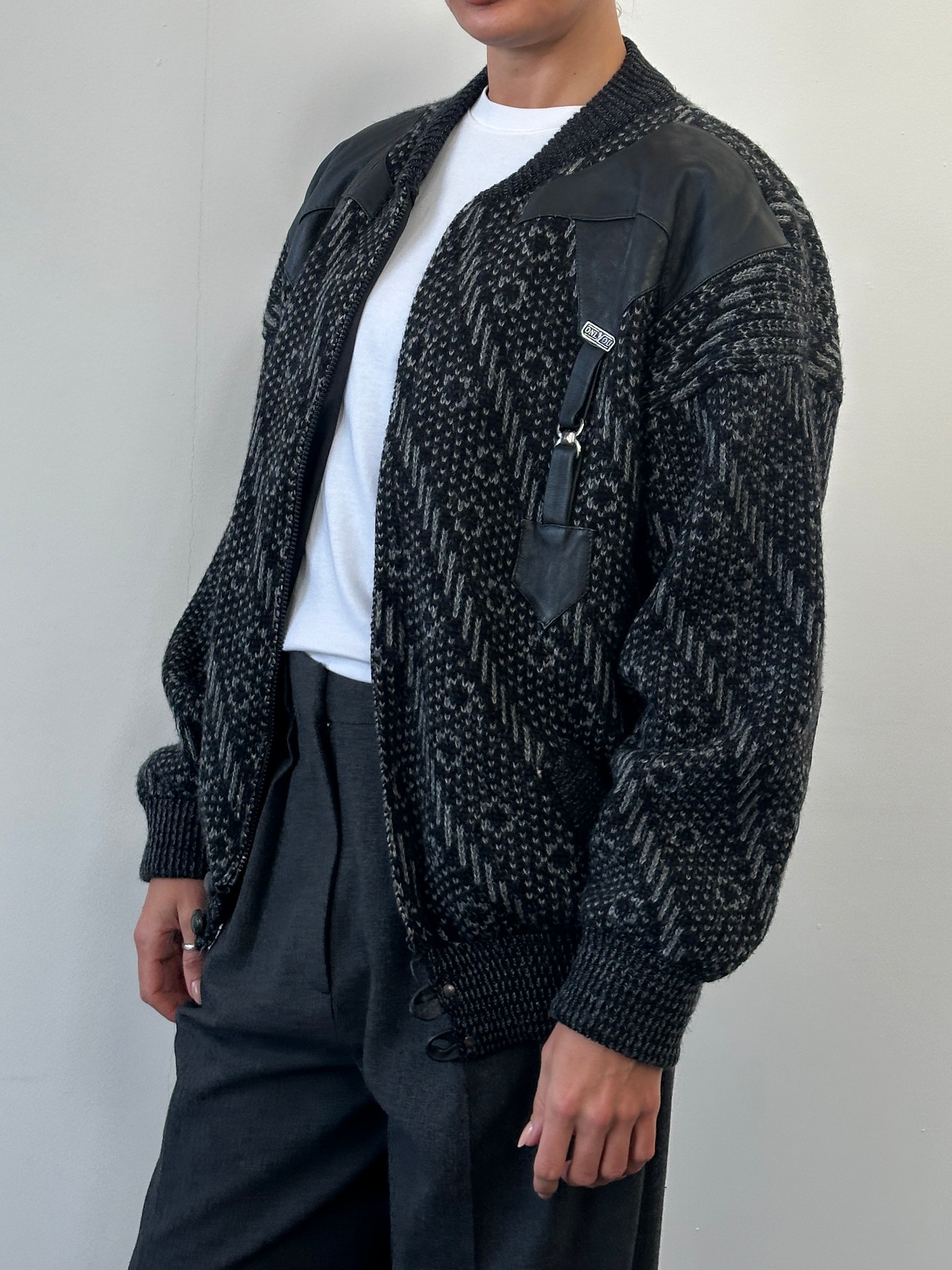Vintage 1980s wool print knit bomber jacket in XL, featuring retro pattern and classic bomber style.
