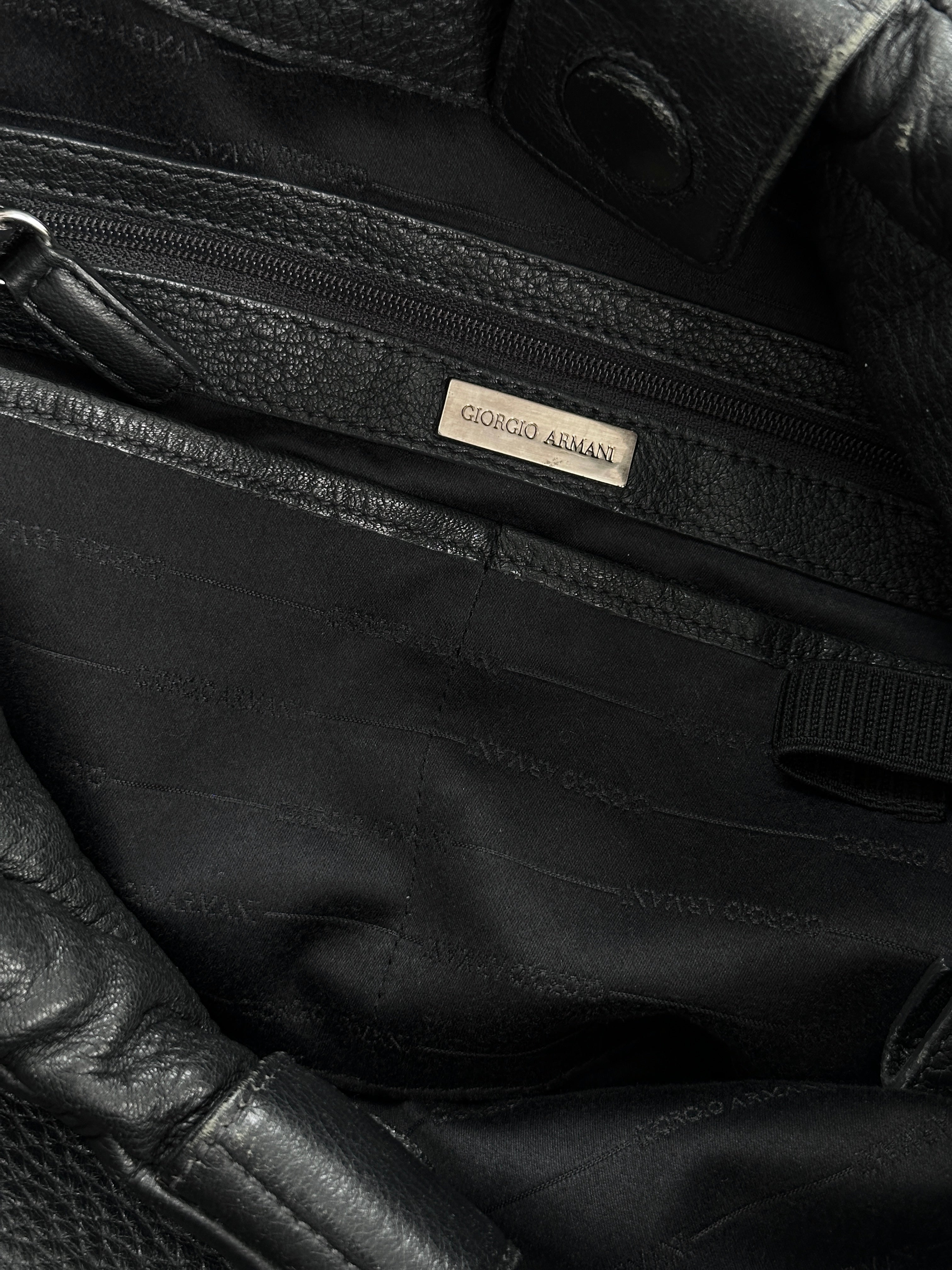 Giorgio Armani 2000s leather hobo shoulder bag in brown with sleek design and subtle logo embellishment