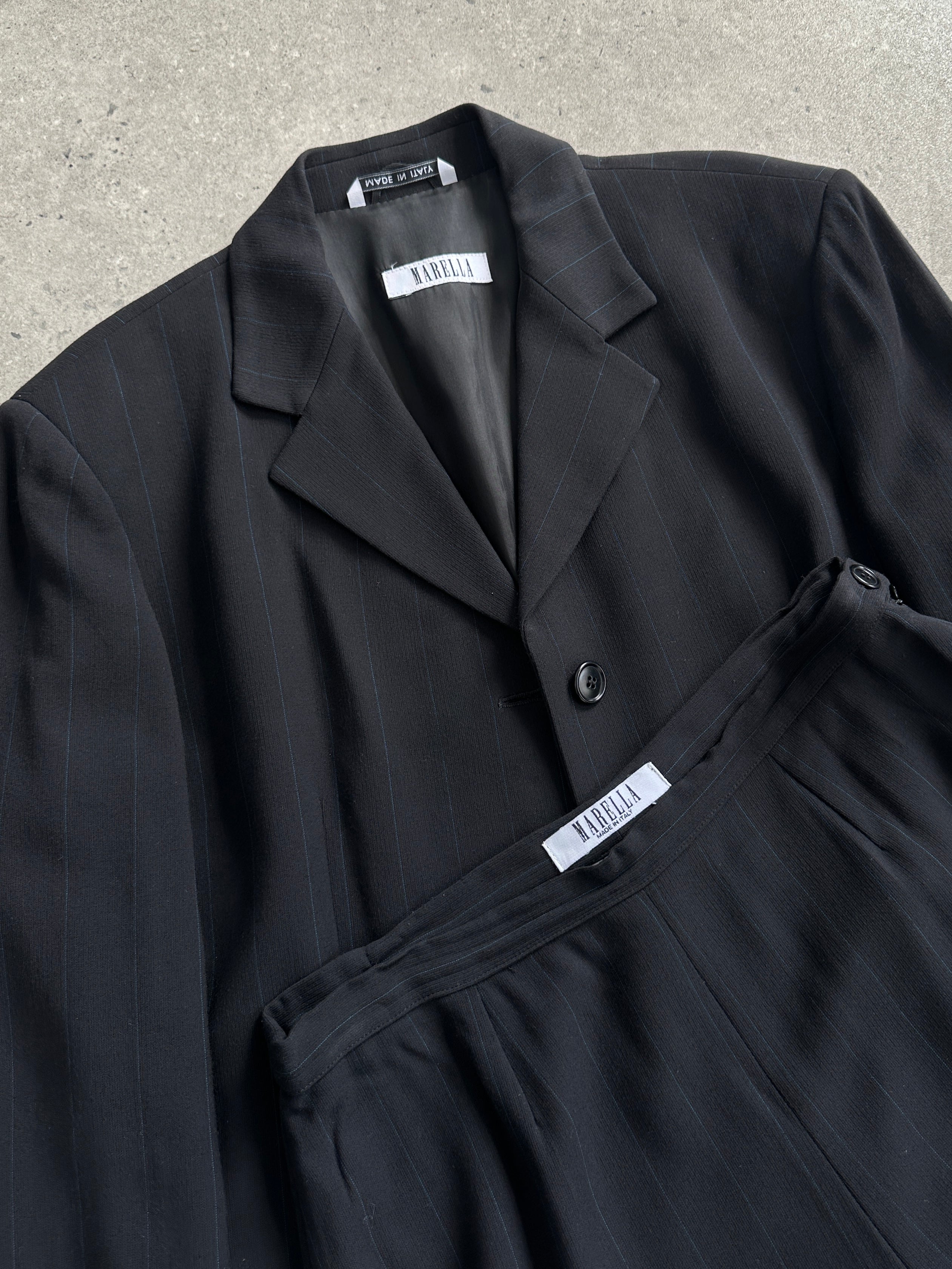 Marella virgin wool blend jumpsuit with stipe pattern, single-breasted design, tailored fit, and full-length legs.