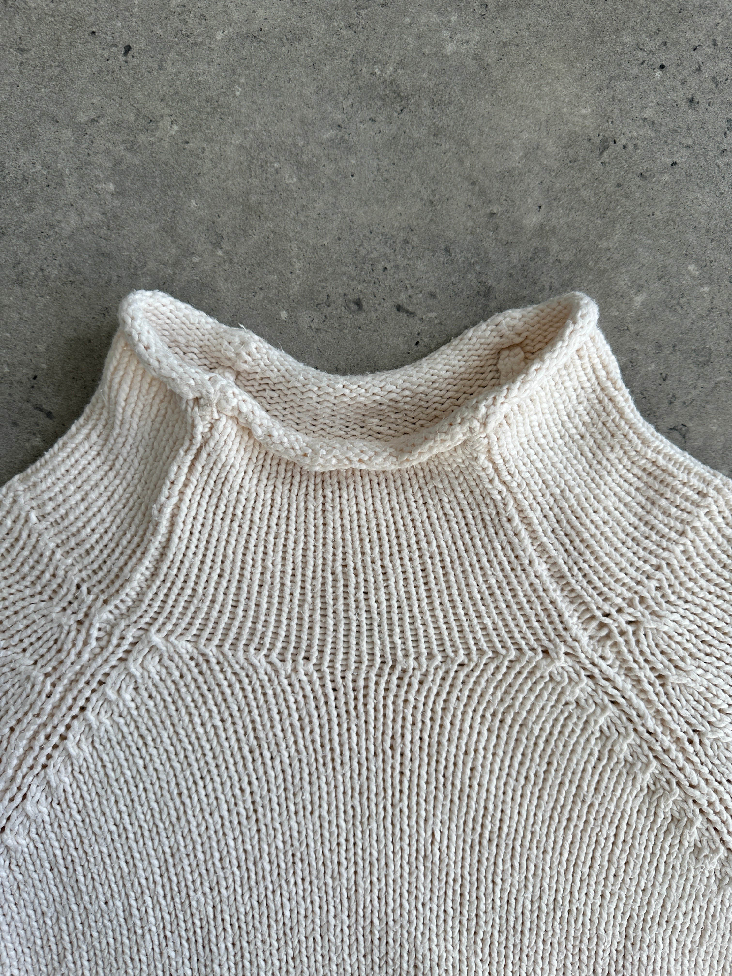 L.L.Bean pure cotton high neck jumper in size M, displayed on a hanger showing the classic fit and soft fabric detail.