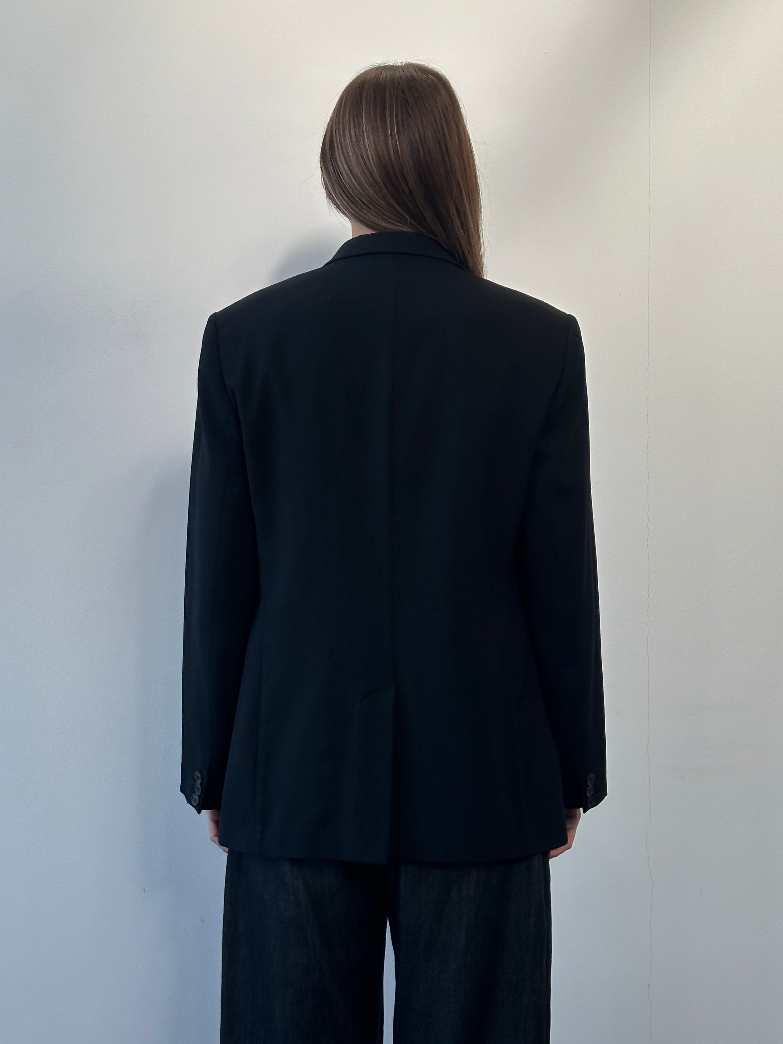 Emporio Armani men's 2000s pure wool single-breasted blazer in classic design, shown in a well-fitted style with a notch lapel.