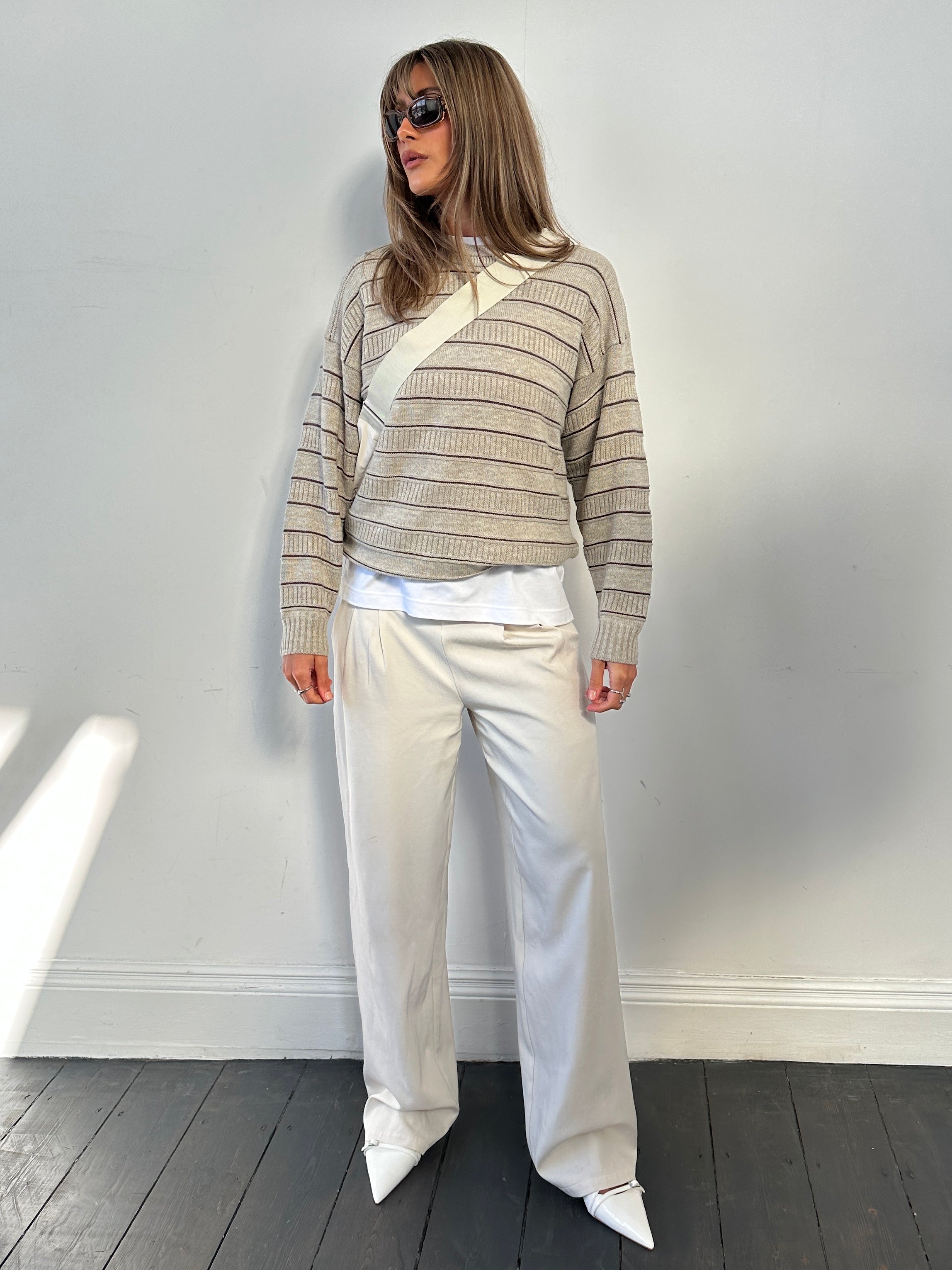 St Michael stripe knitted jumper in size M, featuring a cozy, multicolored striped pattern and ribbed cuffs and hem.
