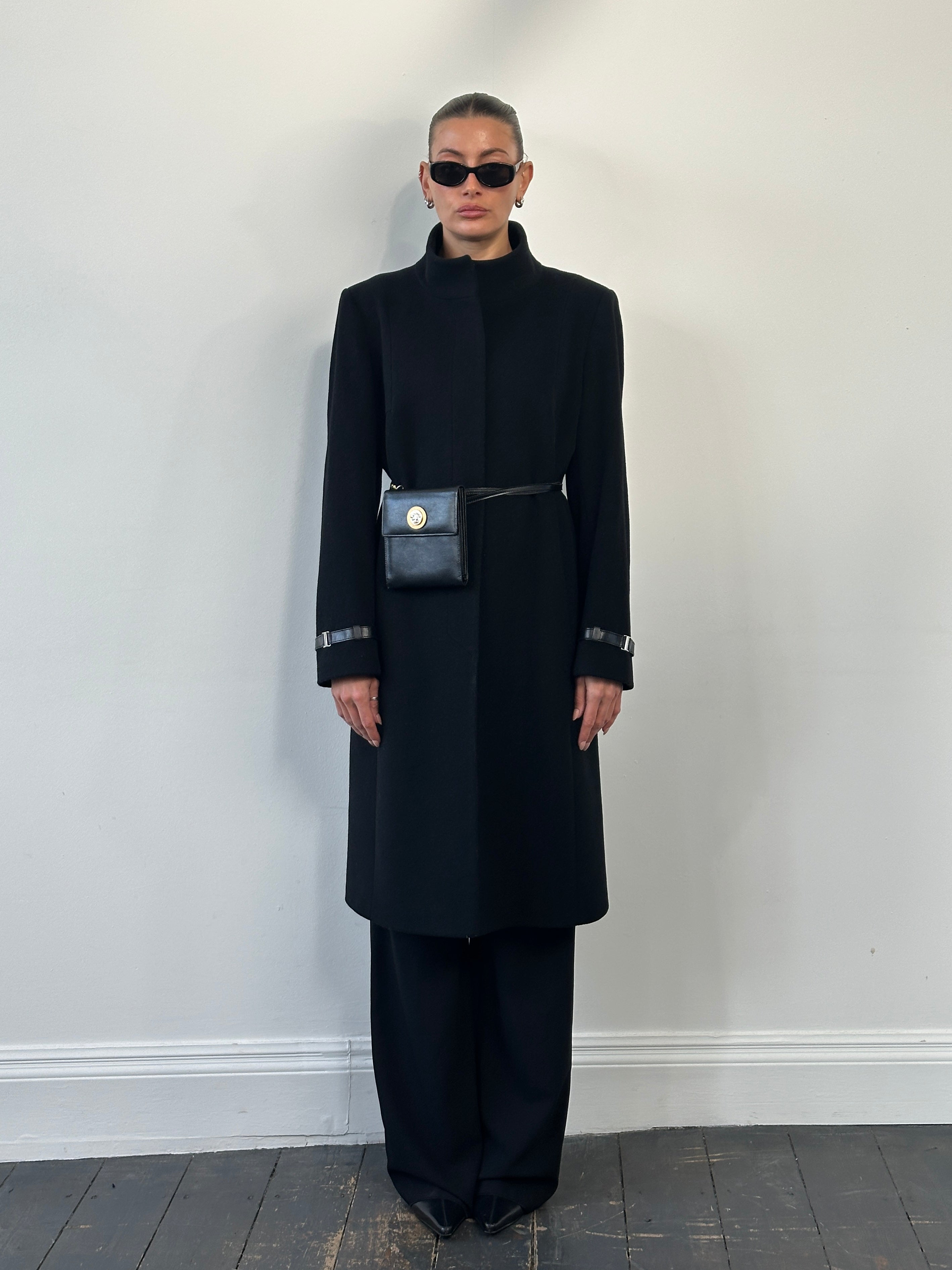 Vintage 1990s wool high neck coat in size L, showcasing its classic design and textured fabric on a neutral background.