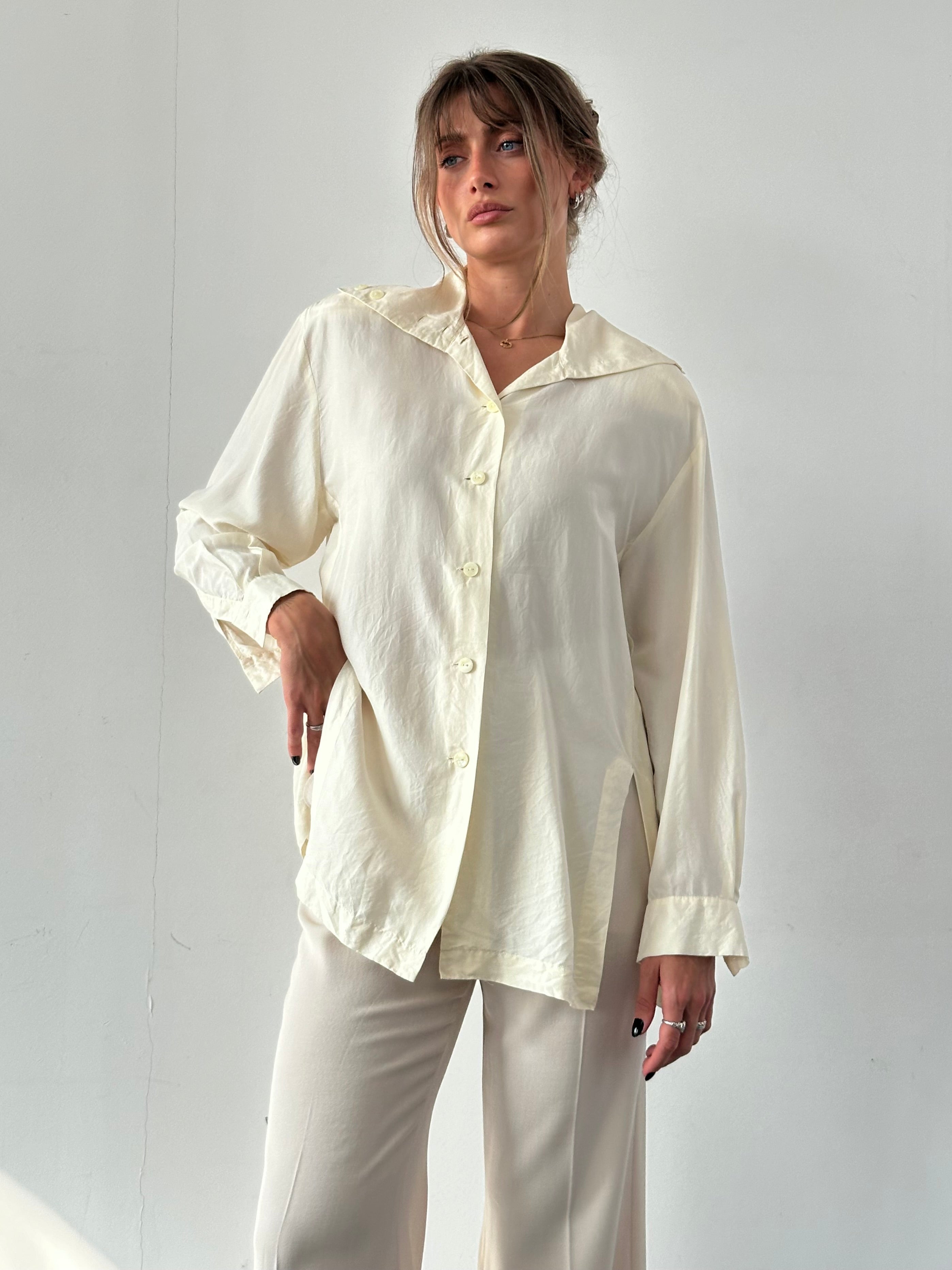 Vintage pure silk side split shirt in XL, featuring a stylish design and classic collar, displayed on a hanger.
