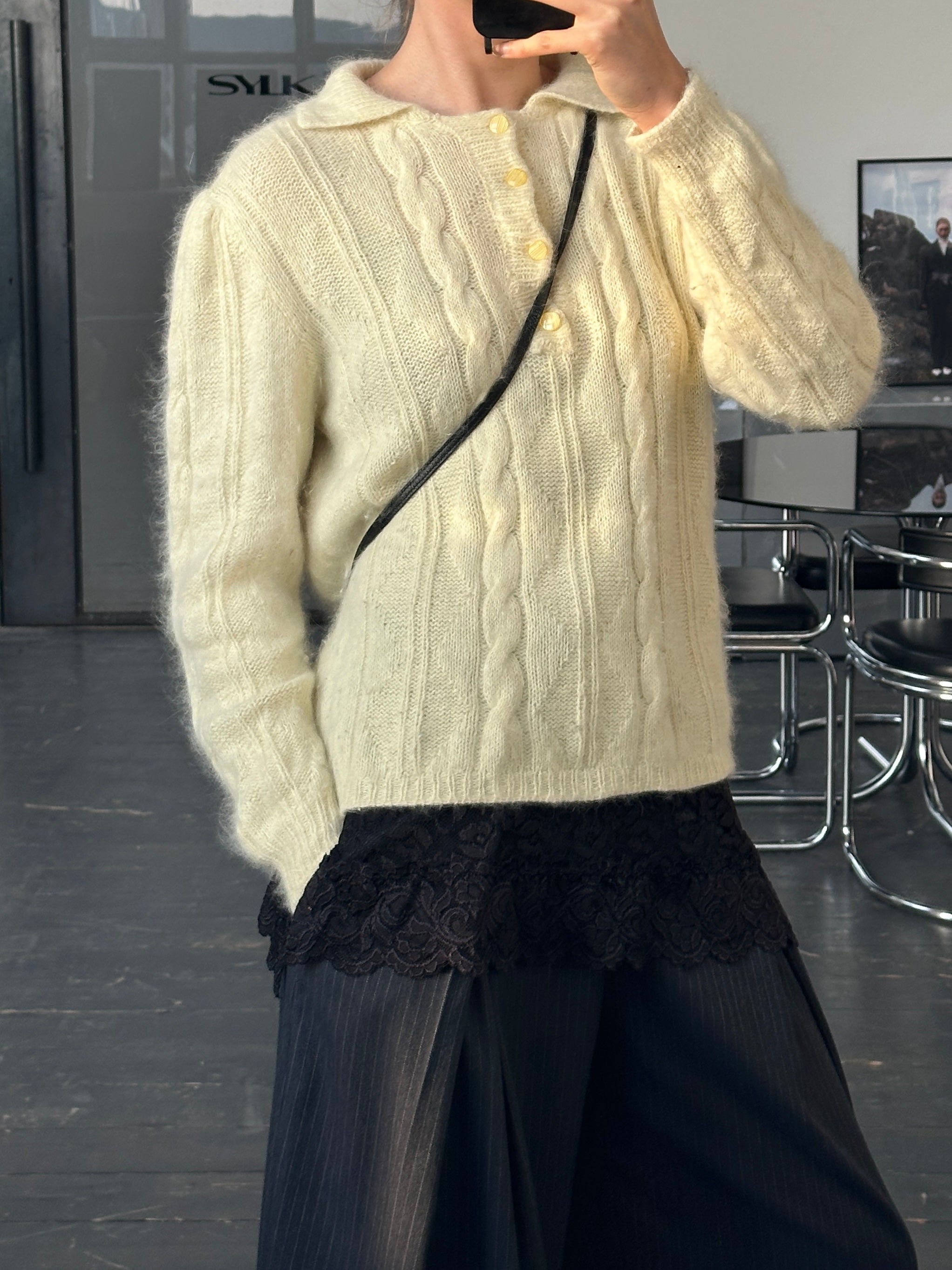 Vintage 1980s Mohair knitted polo jumper in size M, featuring a classic design with a textured pattern and ribbed cuffs.