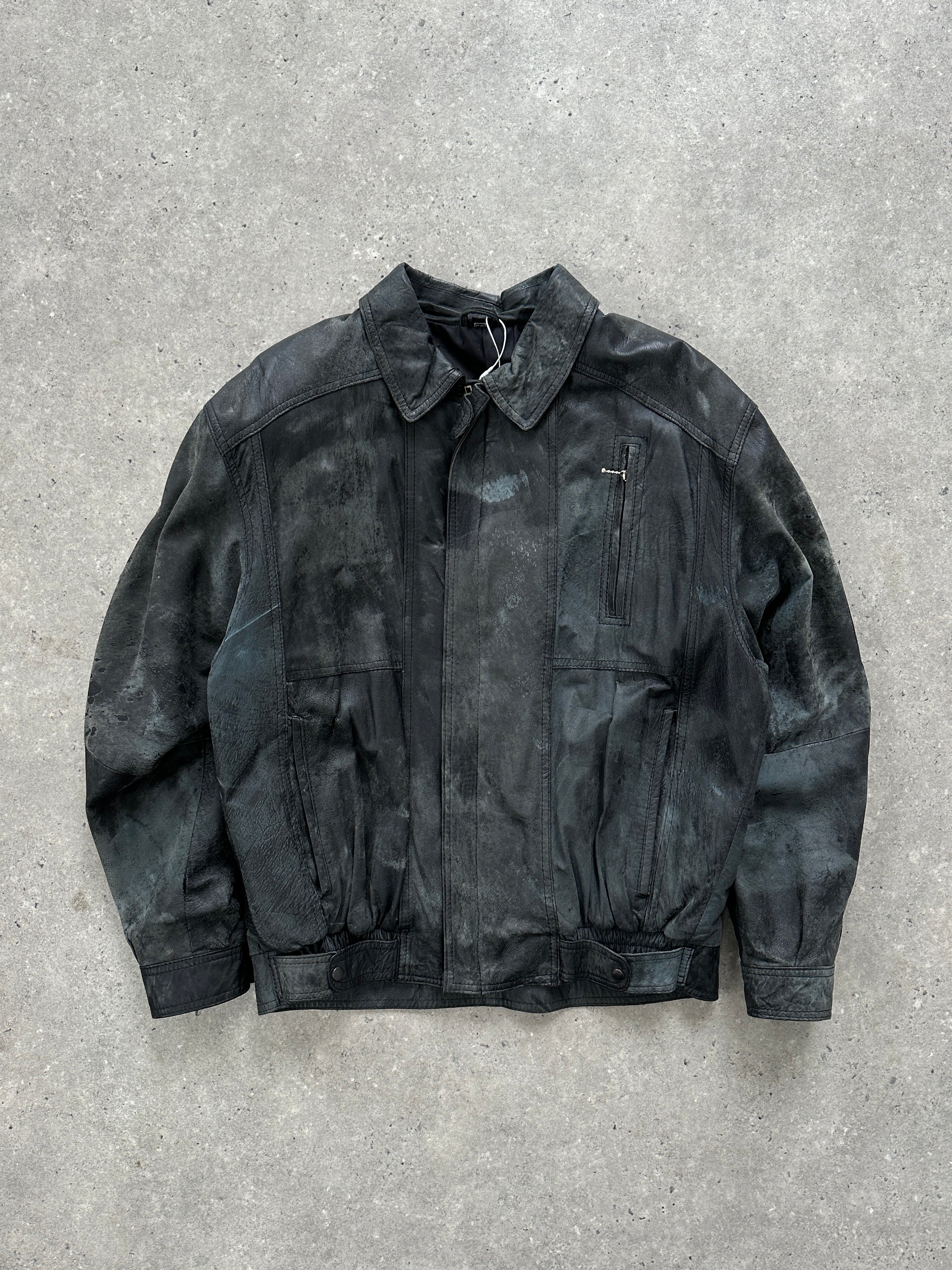 Vintage distressed marbled leather jacket, size M, featuring rugged texture and classic style, displayed on a hanger.