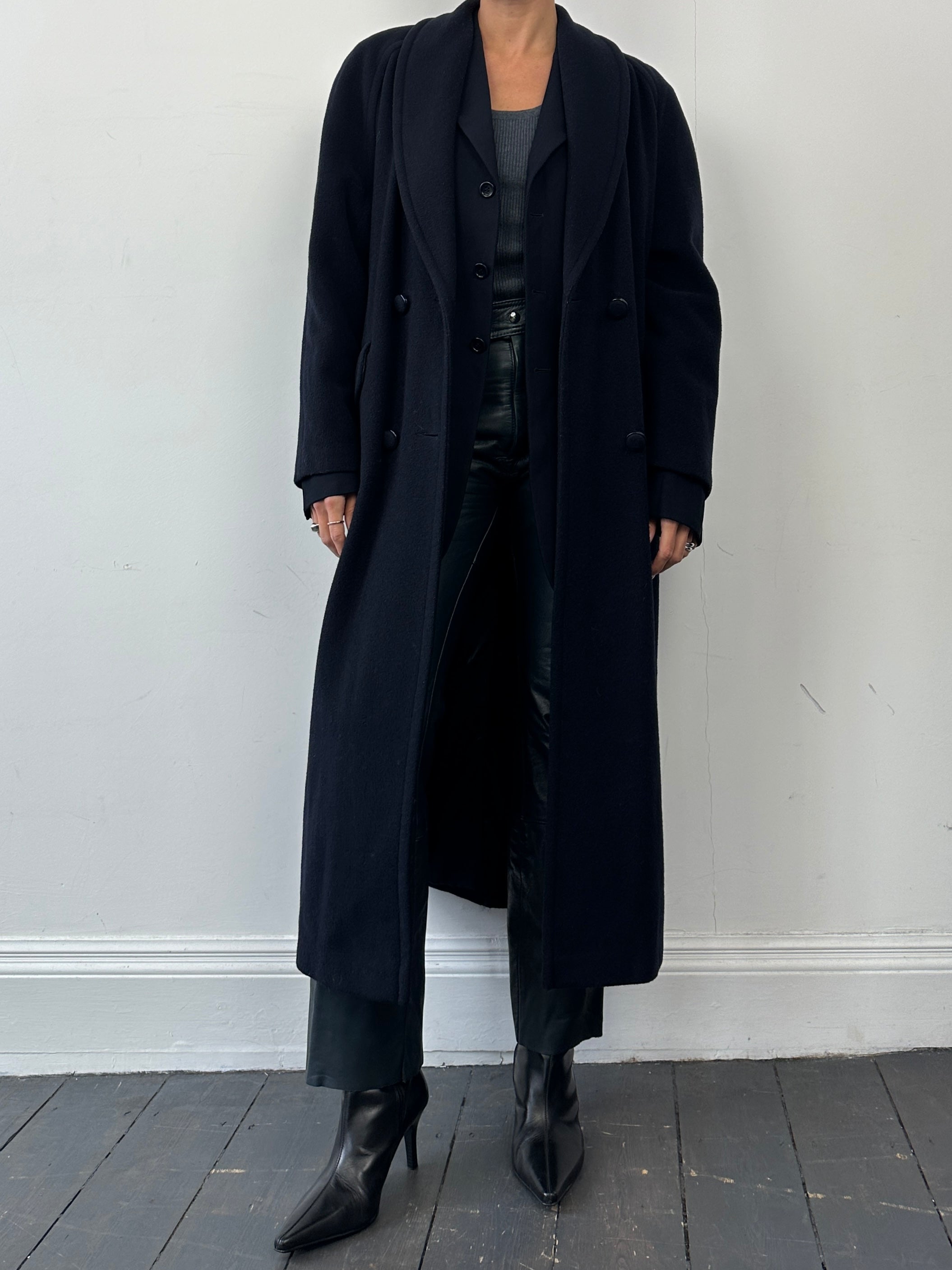 Vintage British vintage wool and cashmere double-breasted coat in size M, shown with classic lapel and button details.