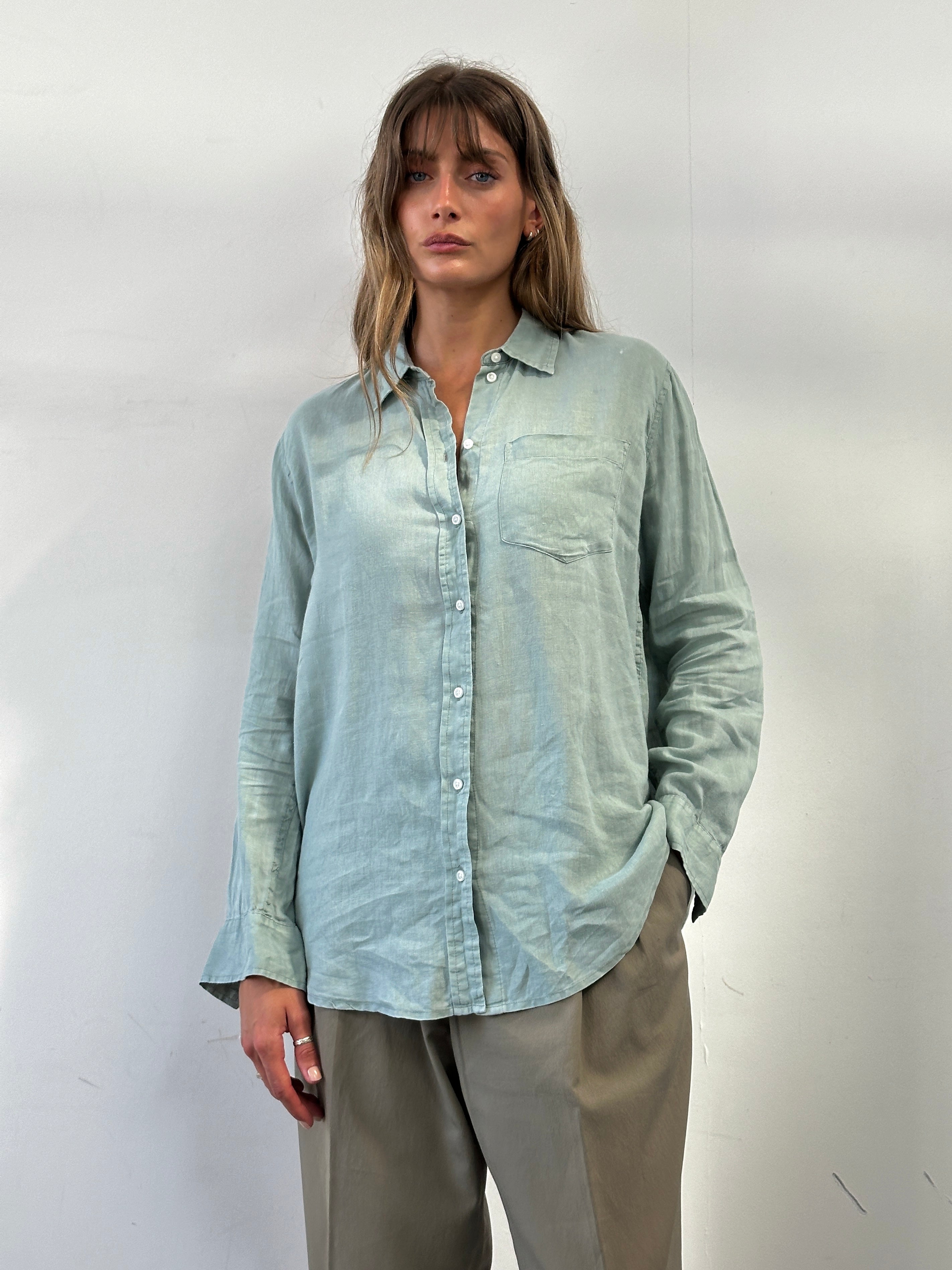 GAP relaxed pure linen shirt in size L displayed on a hanger, showcasing lightweight, breathable fabric and casual fit.
