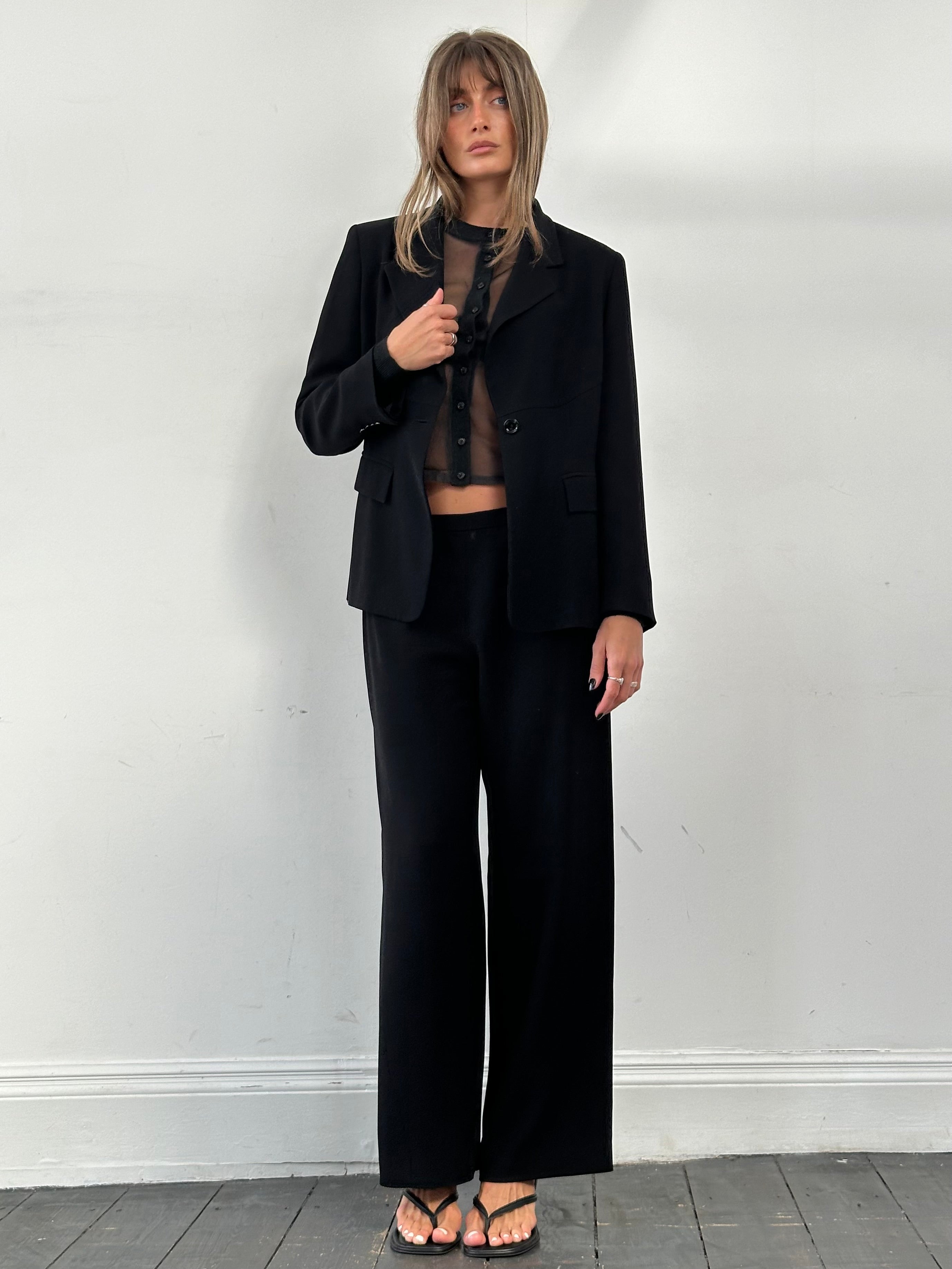 Max Mara minimal single-breasted jumpsuit in S/W32, stylish tailored suit with clean lines and a modern fit.