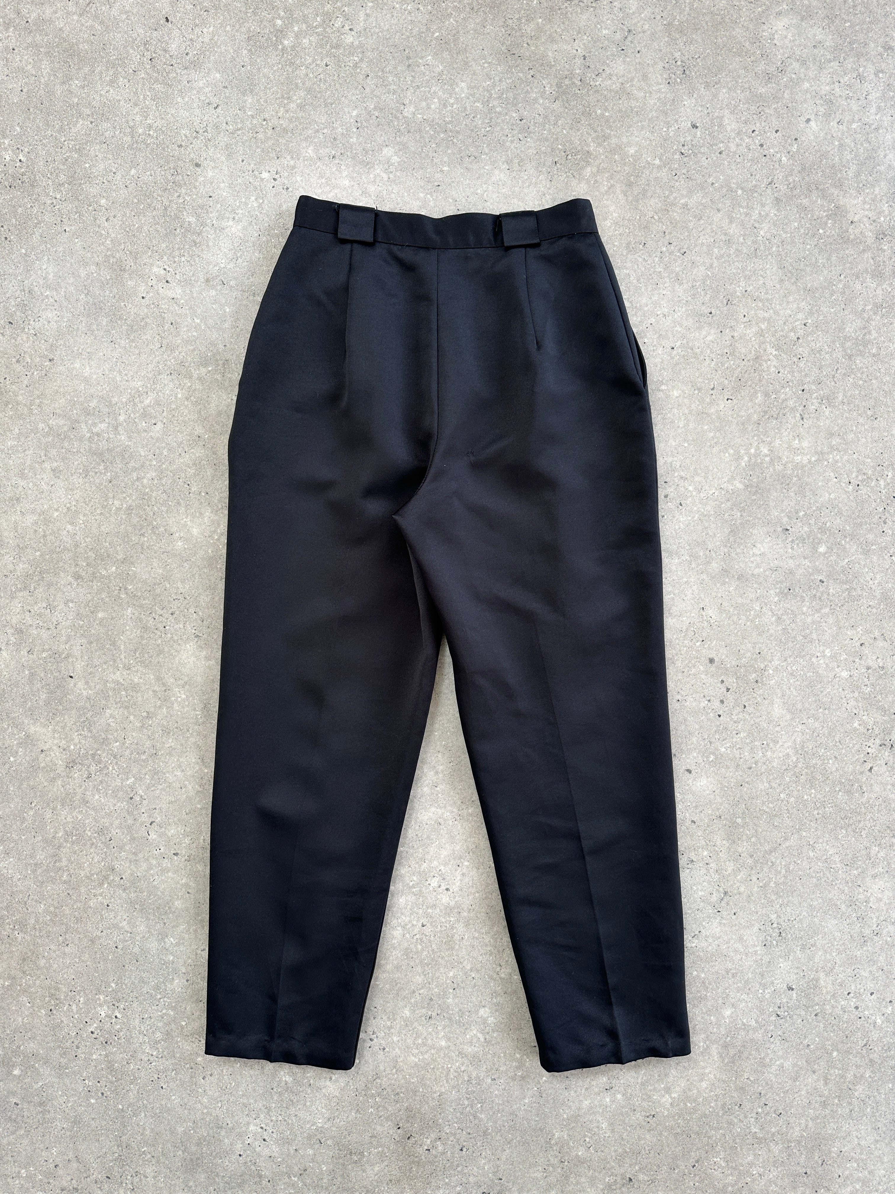 Vintage 1980s satin tapered leg high-waisted trousers in W26, showcasing smooth fabric and classic fit.