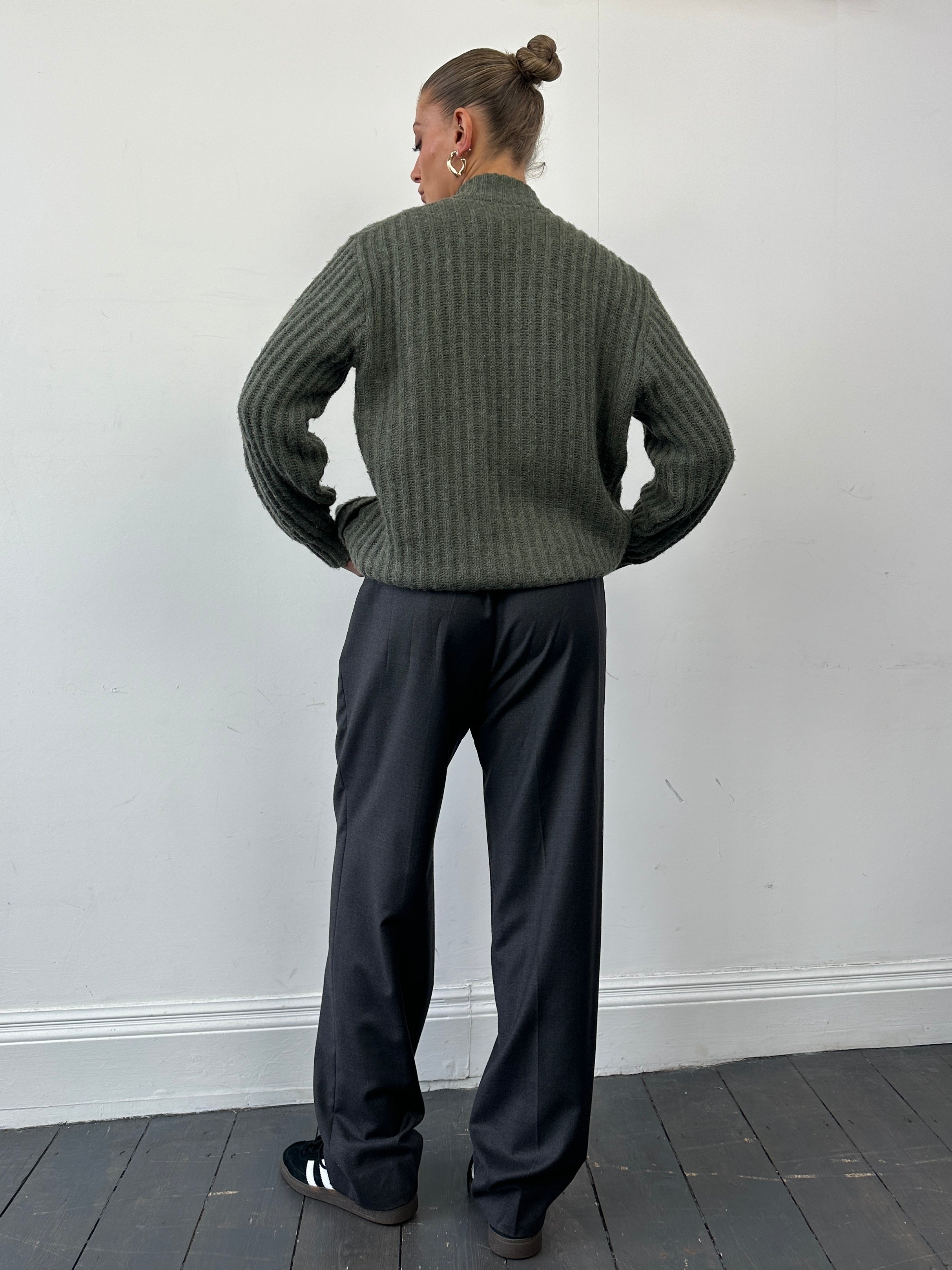 Trussardi wool tailored trousers with pleats and straight-leg fit, displayed on a neutral background.
