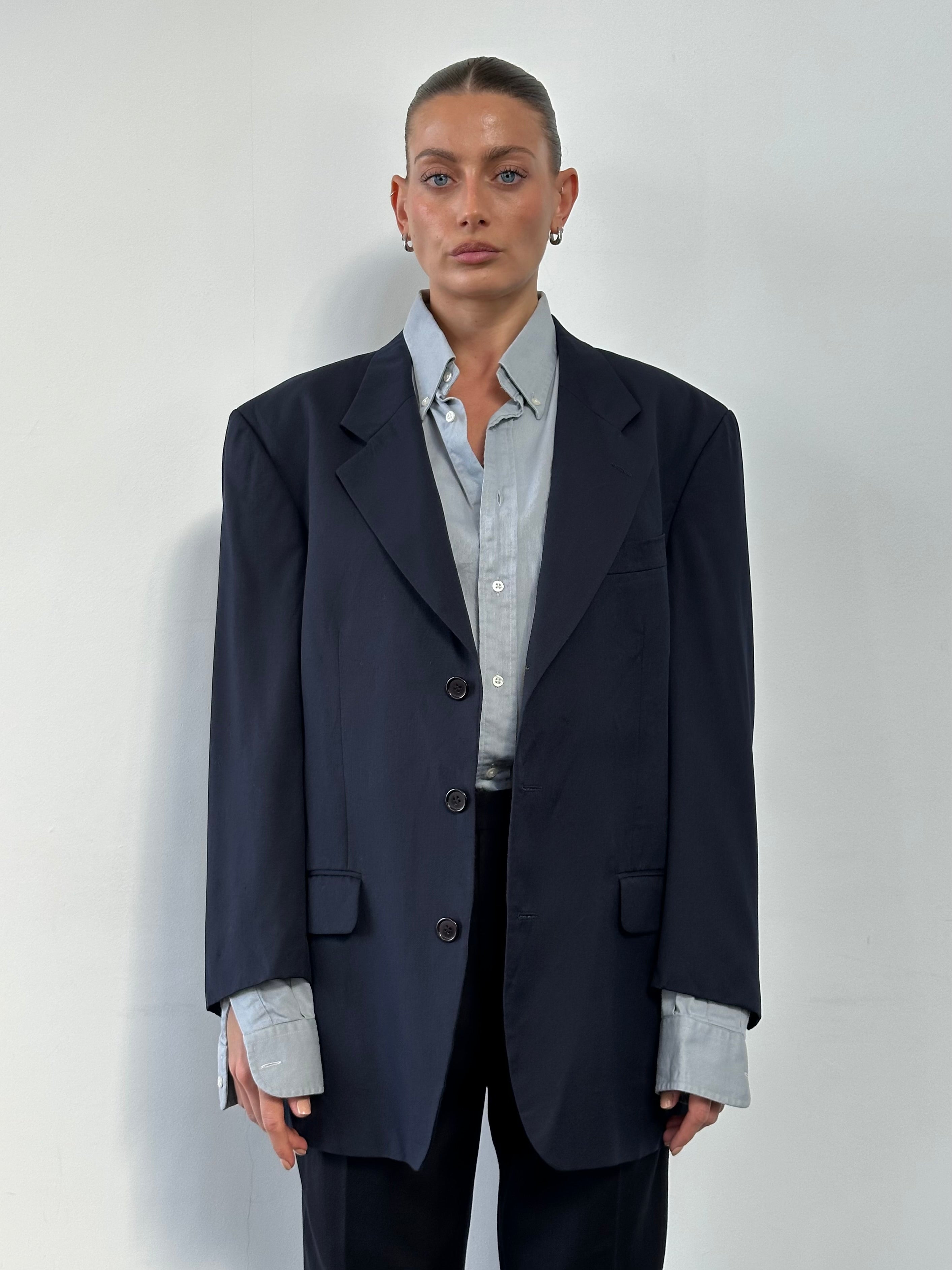 Yves Saint Laurent Pour Homme 1990s wool single-breasted blazer in size L/XL, dark tailored blazer with structured lapels.