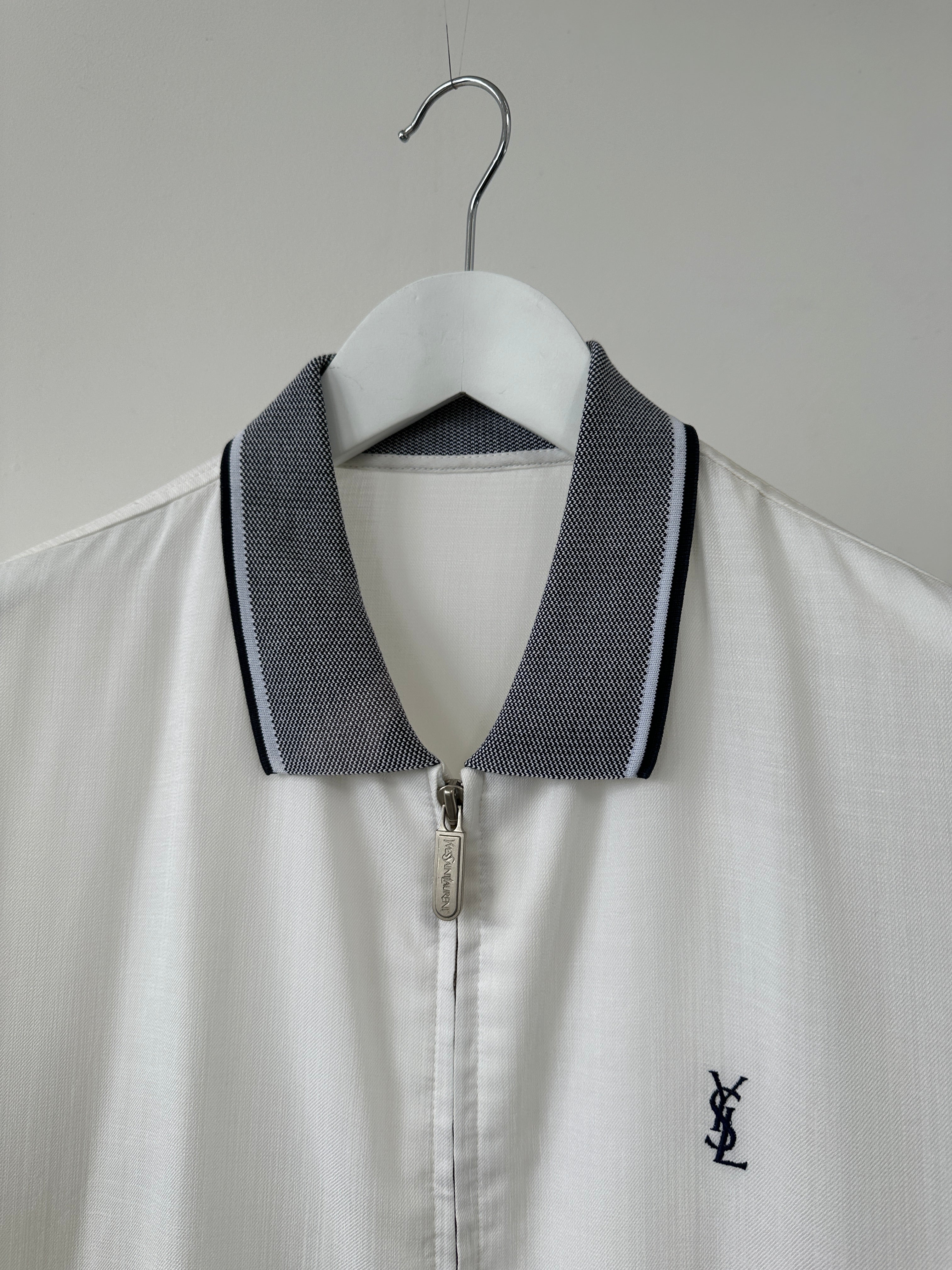 Yves Saint Laurent Pour Homme logo bomber jacket in size L, black jacket with YSL branding and ribbed cuffs and collar.