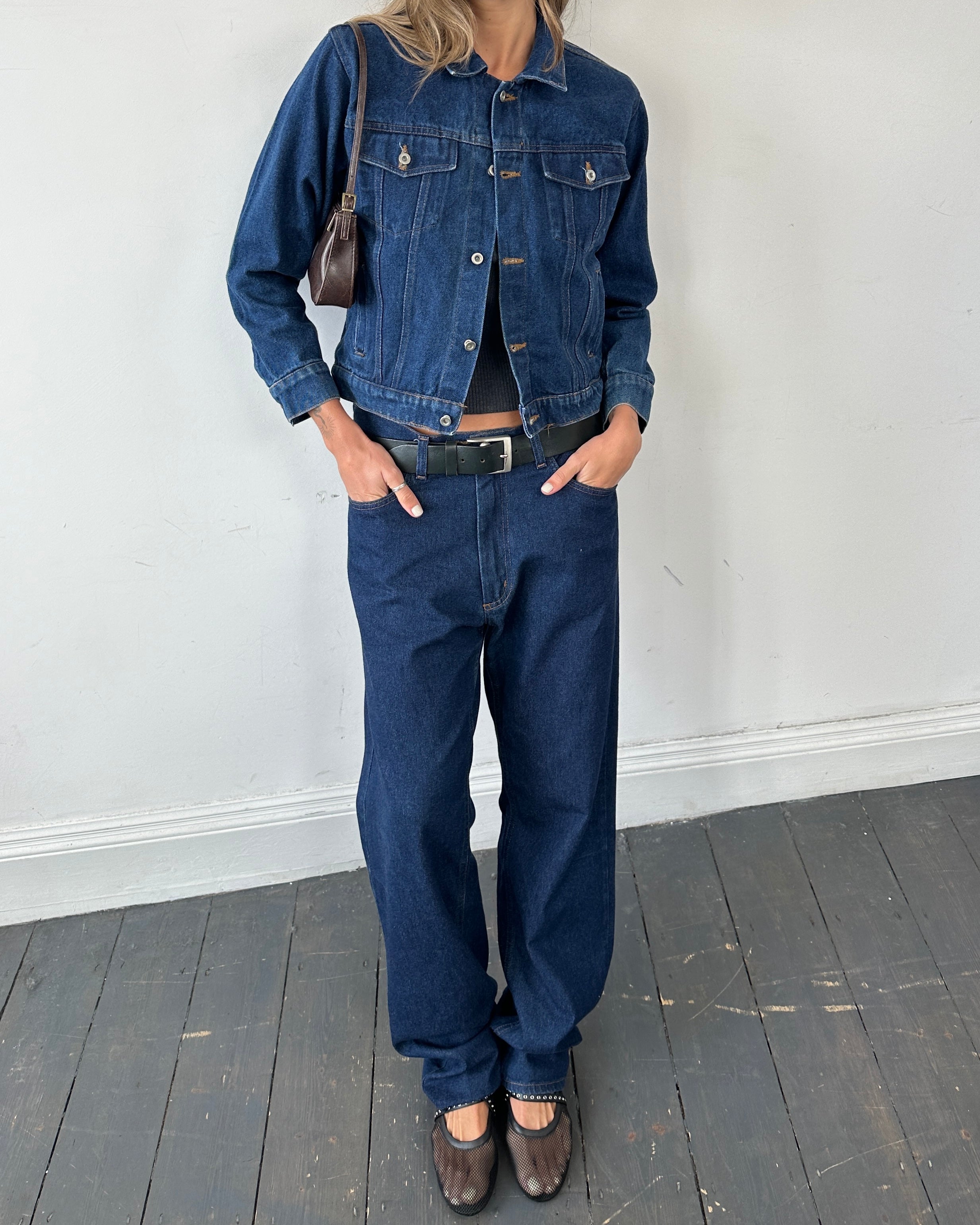 Valentino high waisted straight leg denim jeans in W34, showcasing classic blue denim with a fitted waist and relaxed leg fit.