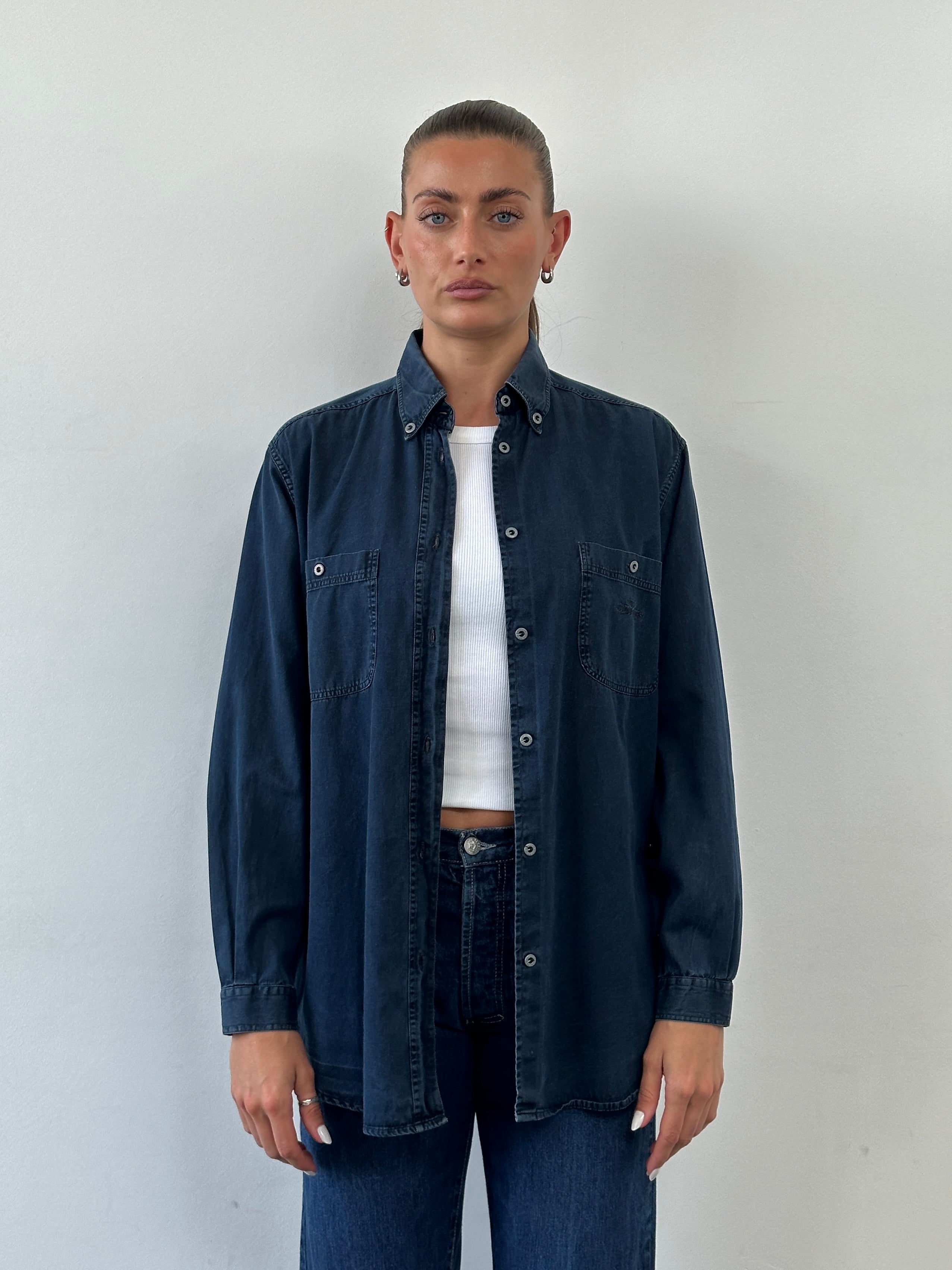 Armani Jeans denim logo shirt in size L, featuring a casual design with Armani logo embroidery on the chest.