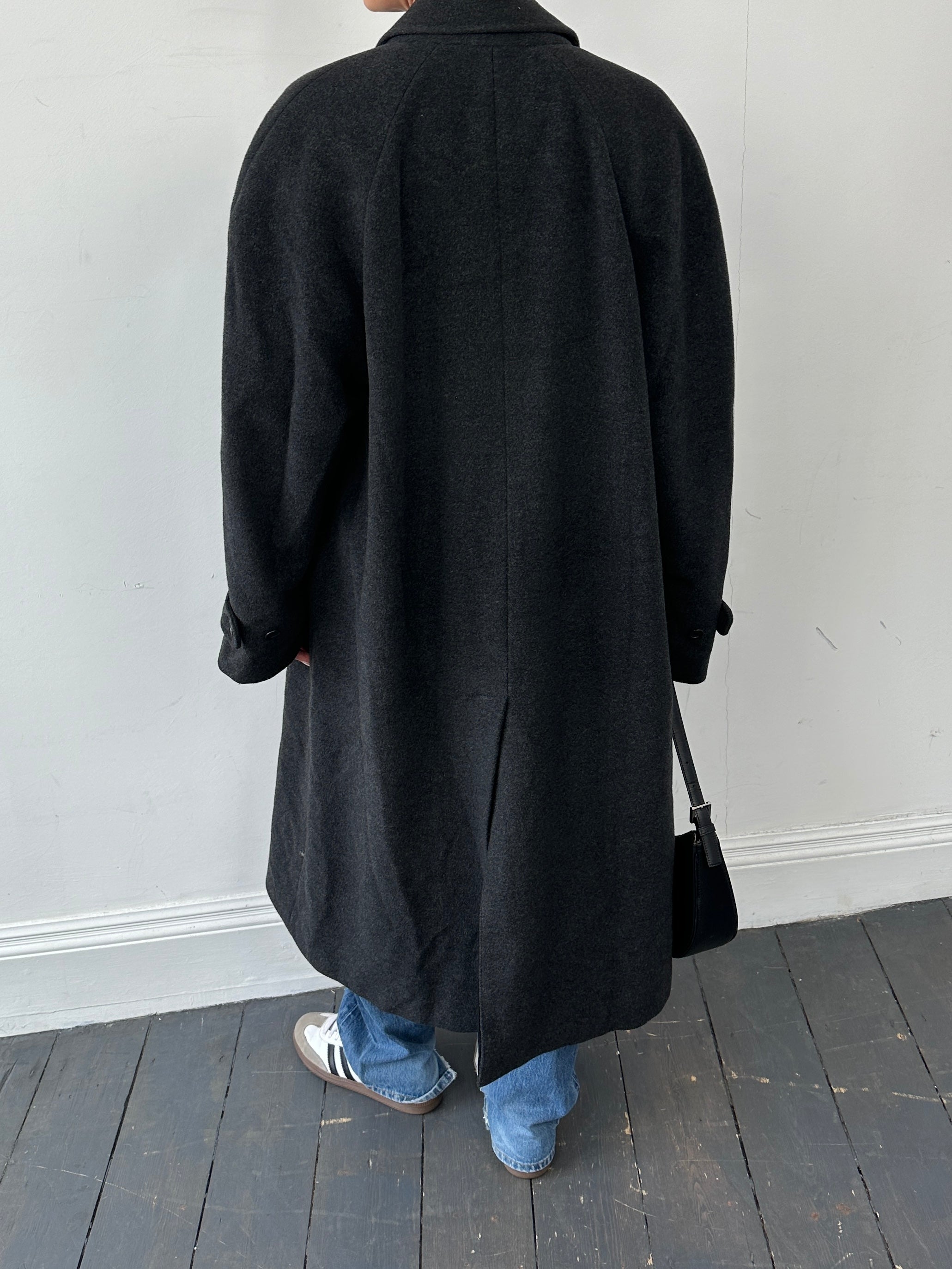 Valentino pure wool concealed placket single-breasted coat in XXL, showcasing a tailored design with classic lapels and button details.