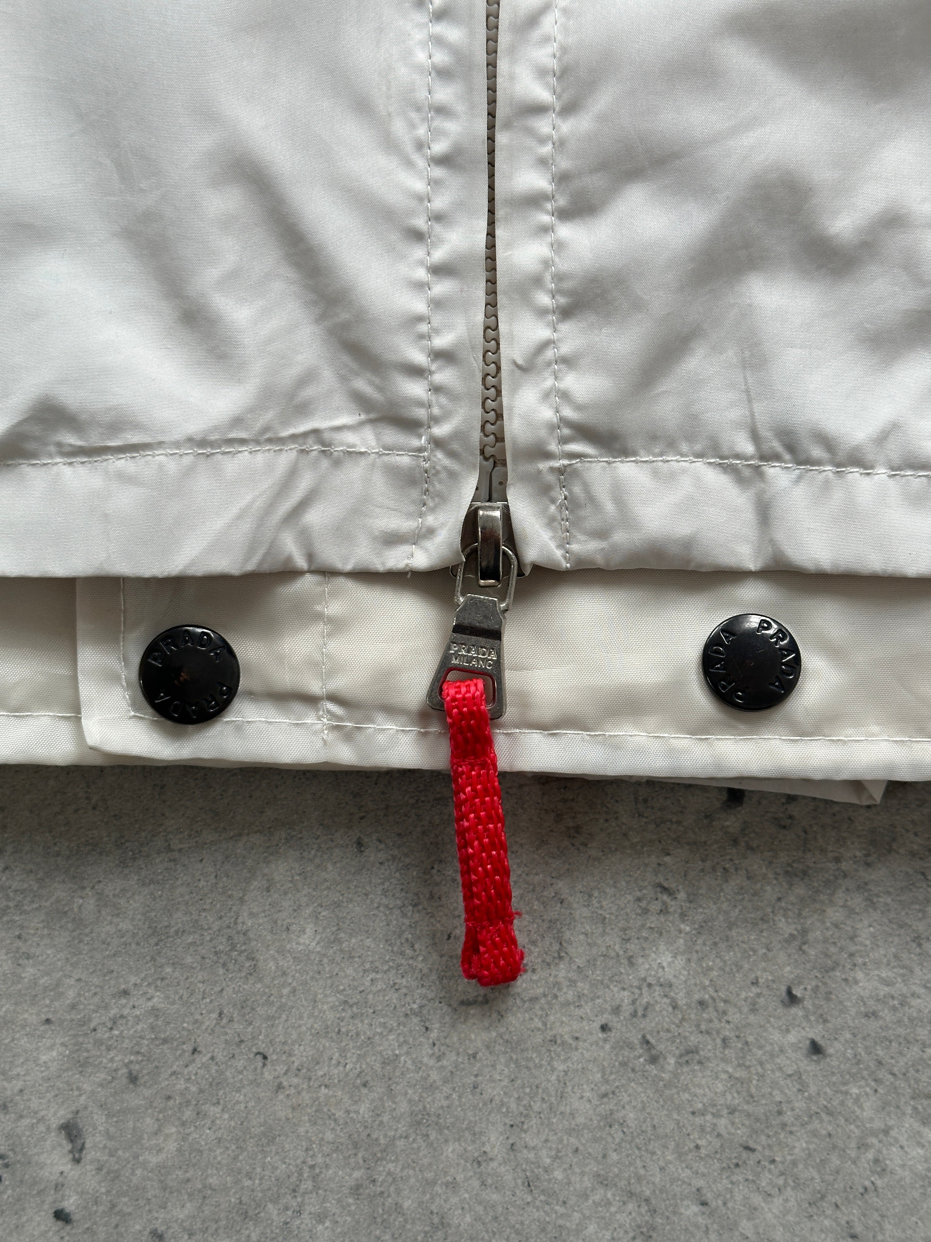 Prada sleeveless nylon gilet vest with double zip closure, displayed in size XL, featuring a sleek, modern design.