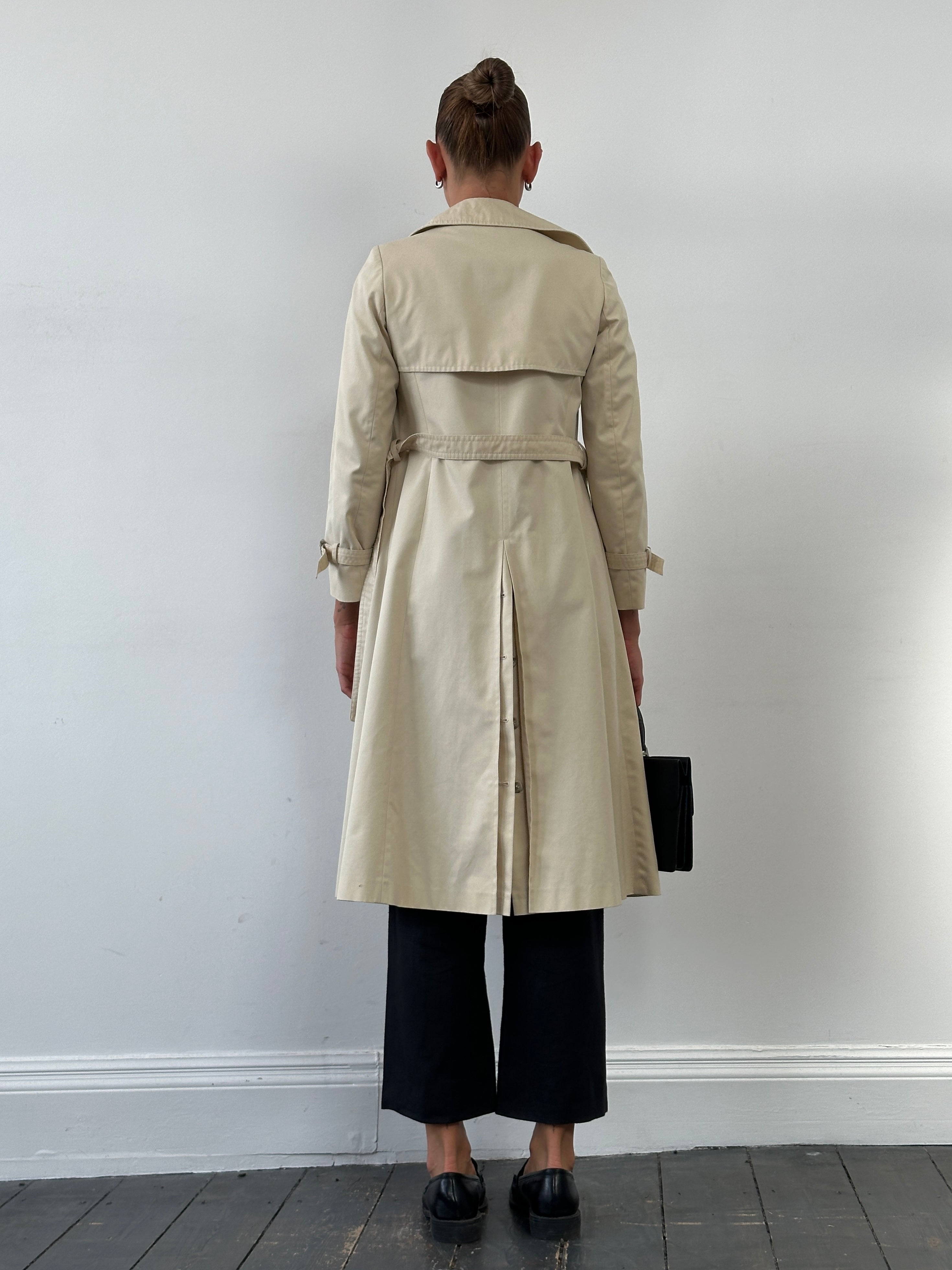 Vintage 1980s cotton double-breasted belted trench coat in size XS, classic style with tailored fit and timeless design.