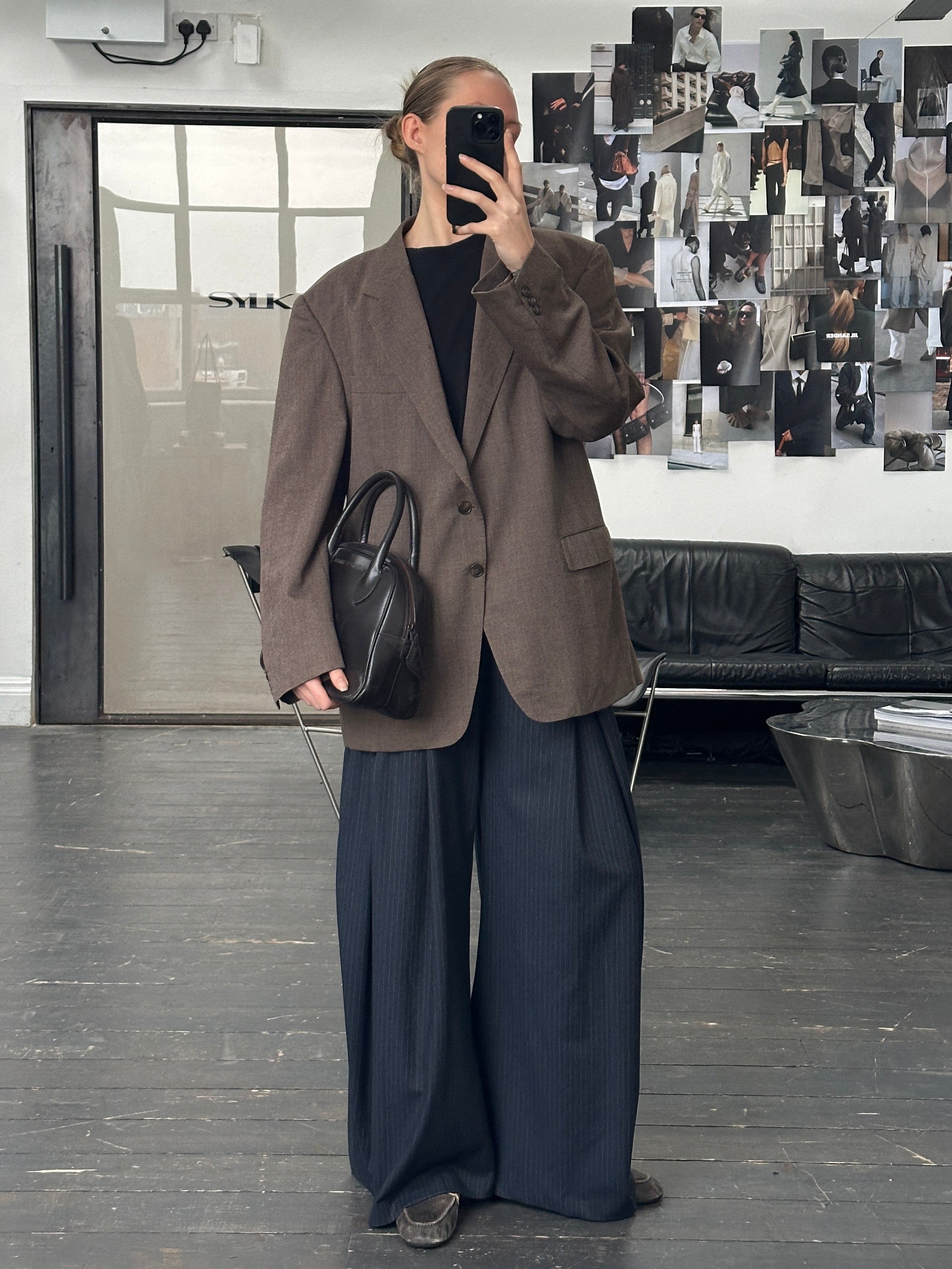 Christian Dior Monsieur 1990s wool single-breasted blazer in size 46R/XXL, dark tailored blazer with notch lapels and button closure.