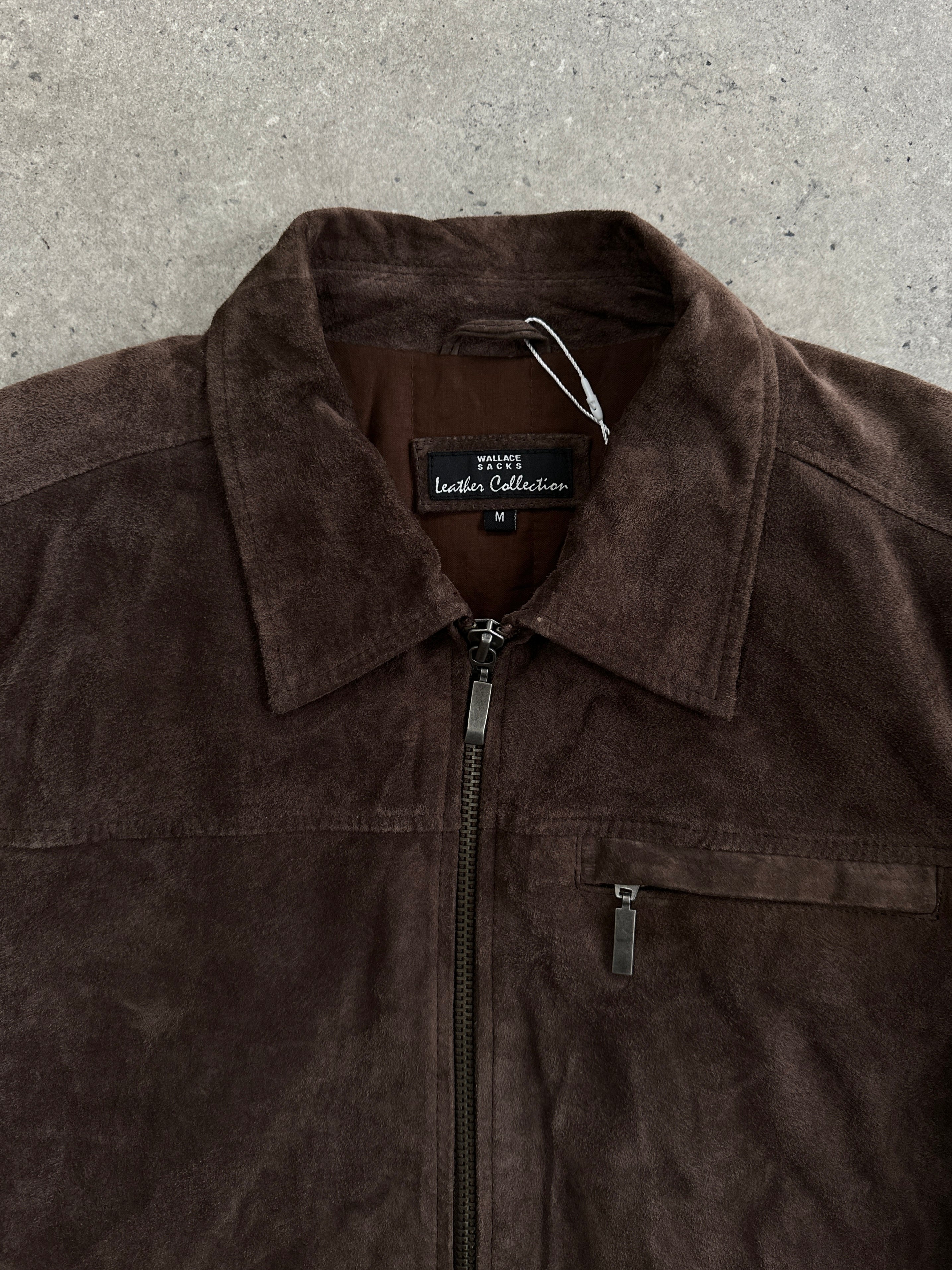 Vintage suede zip-up jacket in size L, featuring a classic design with a front zipper and soft suede material.