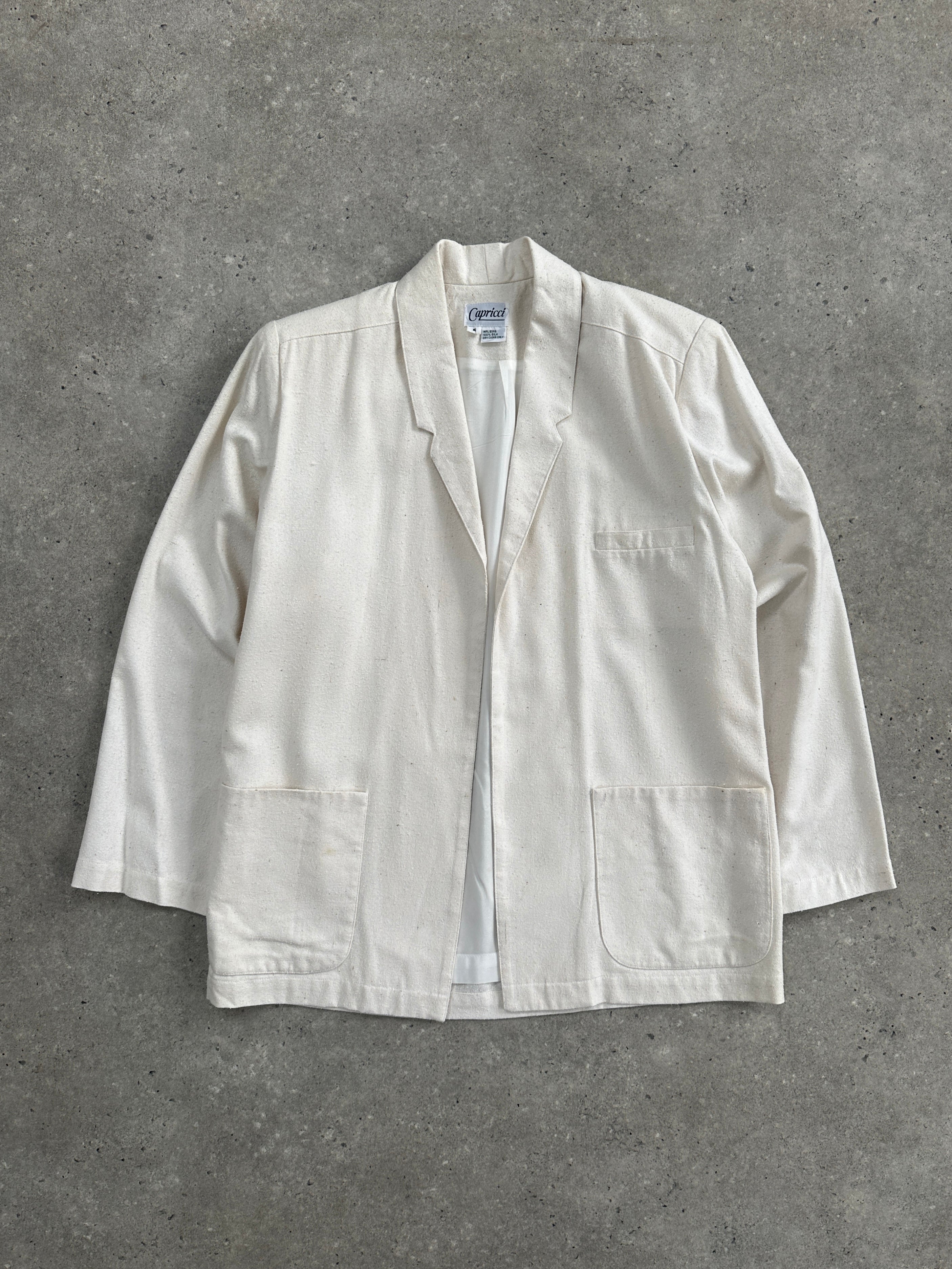 Vintage pure silk minimal blazer in size S/M, shown in a sleek, elegant design with clean lines and tailored fit.