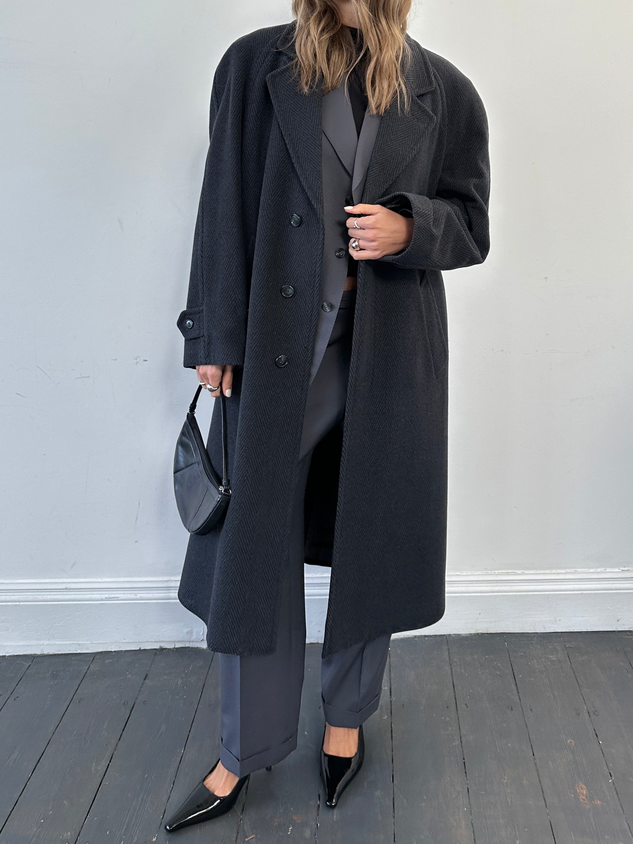 Vintage British wool and cashmere herringbone coat with concealed placket in XL, showcasing classic style and textured fabric.