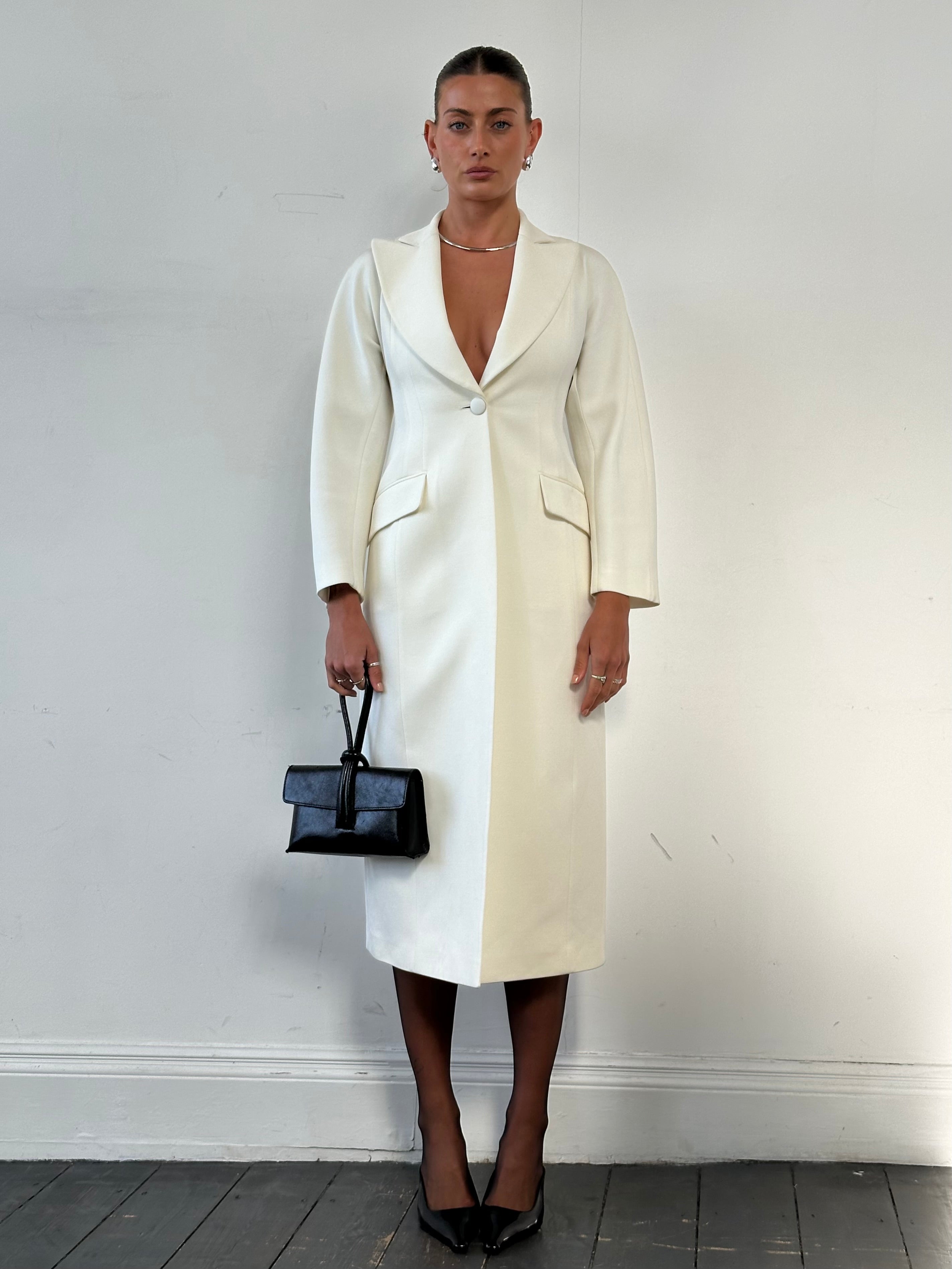 Emporio Armani wool blend fitted coat in size S, stylish and tailored, displayed on a hanger with a neutral background.