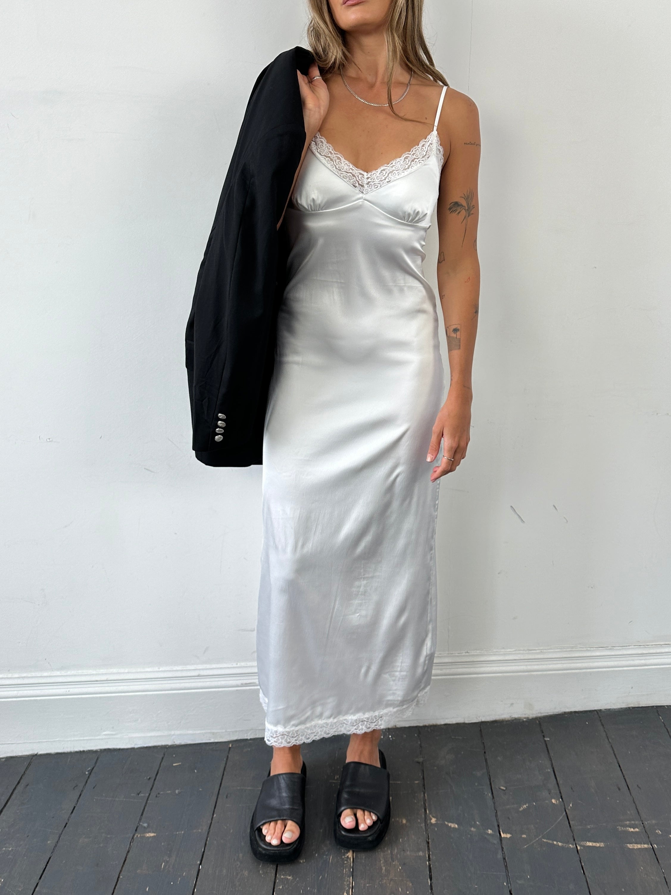 Vintage satin lace trim floor-length slip dress, size small, featuring elegant lace details and a vintage-inspired design.