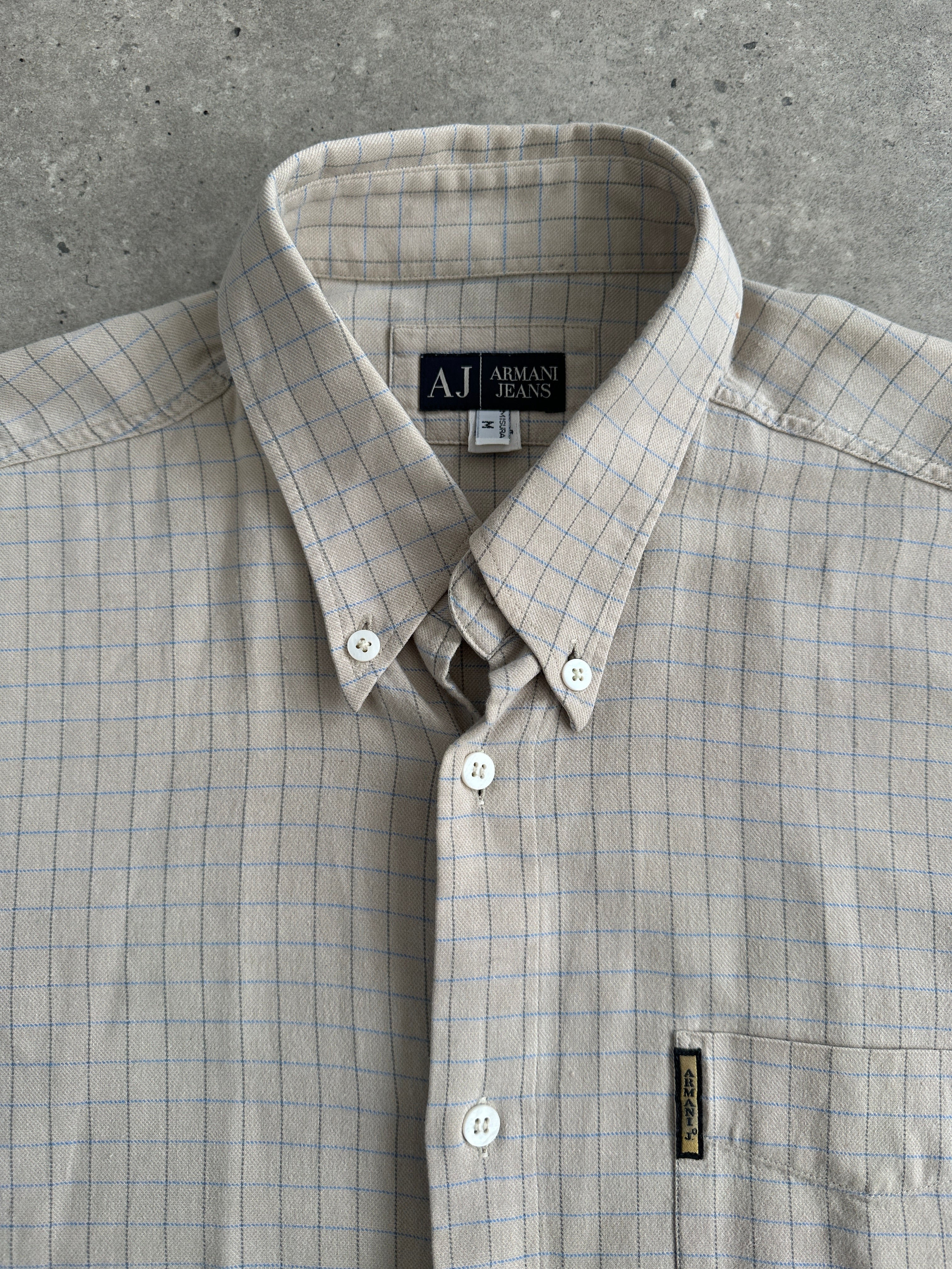 Armani Jeans check pure cotton logo shirt in size L/XL, featuring a classic checked pattern and branded logo detail.