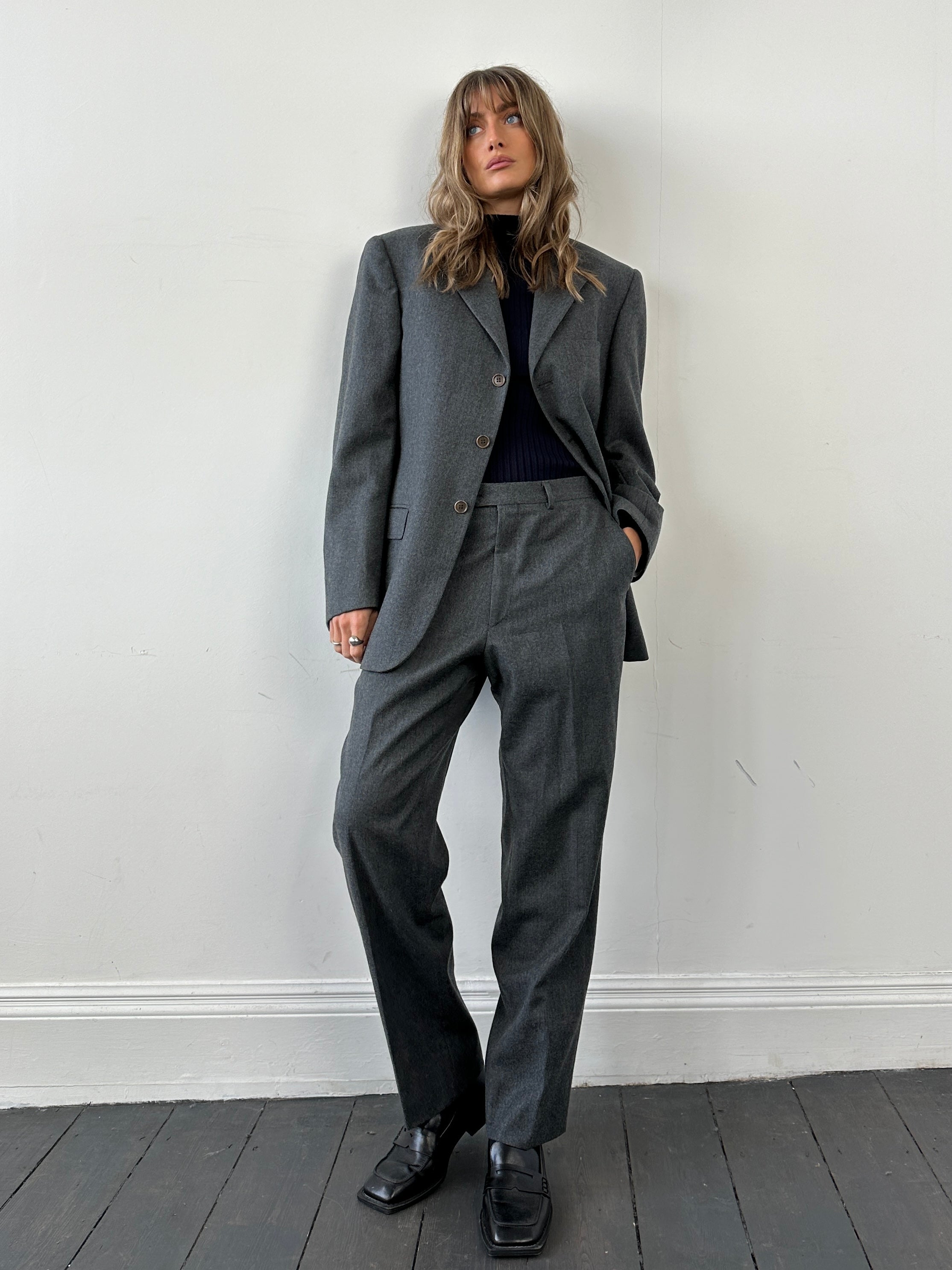 Missoni pure wool single-breasted jumpsuit in size 42R/W32, featuring tailored fit and classic design, displayed on a neutral background.