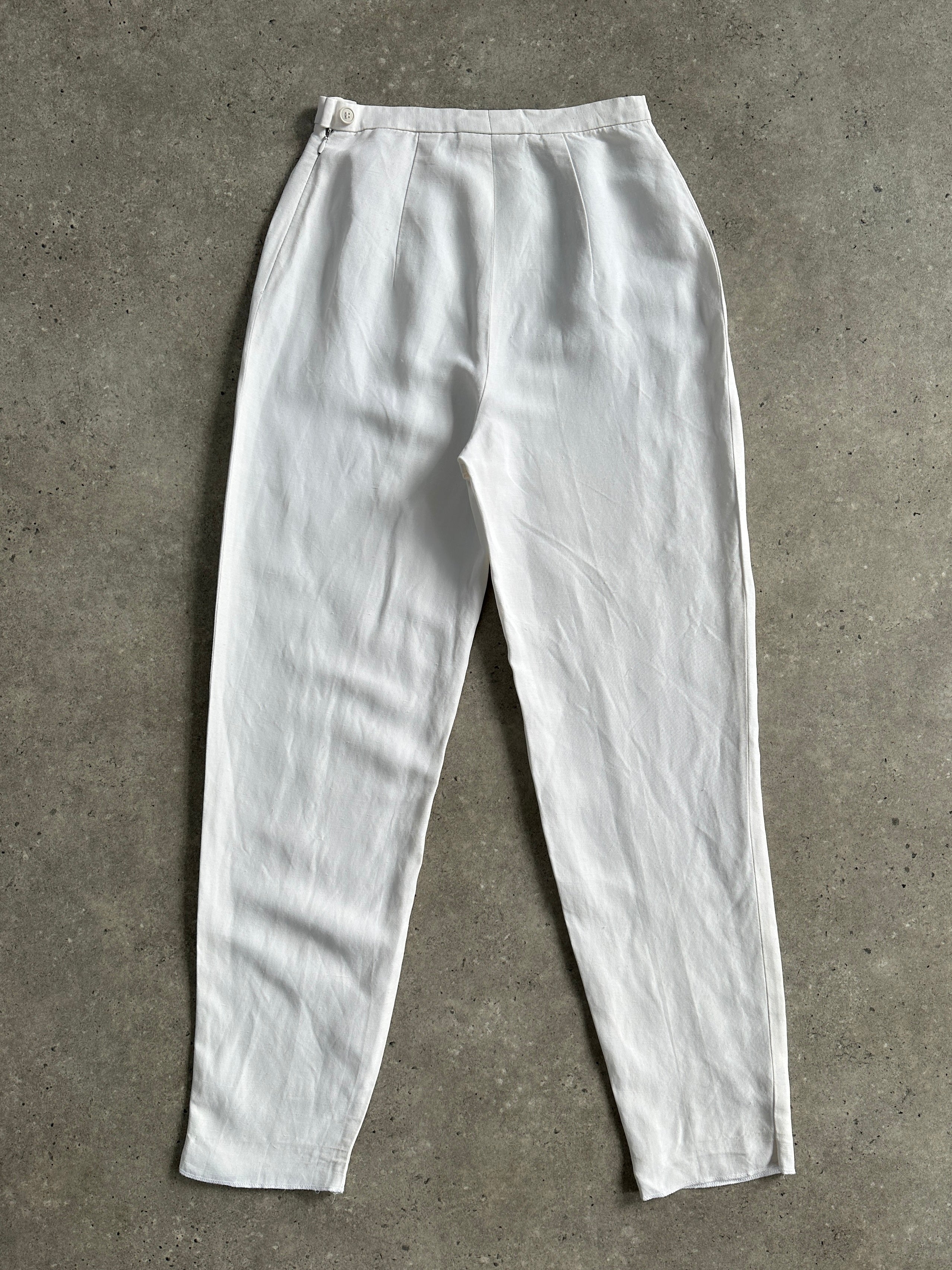 Max Mara linen tapered leg high-waisted trousers in W24, shown on a model with a neutral background.