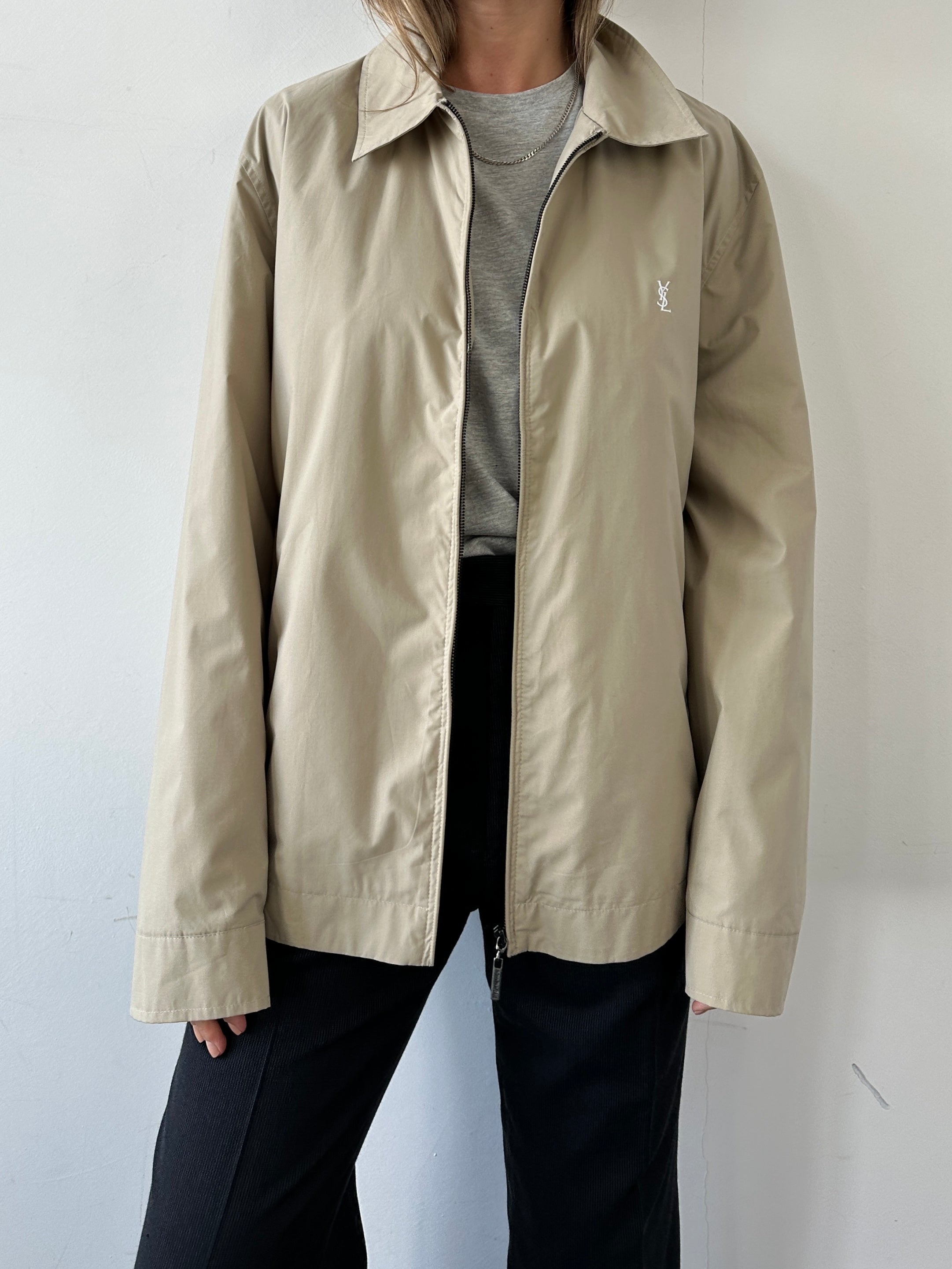 Yves Saint Laurent Harrington logo jacket in size XL, black with prominent YSL logo on front, stylish and casual outerwear.