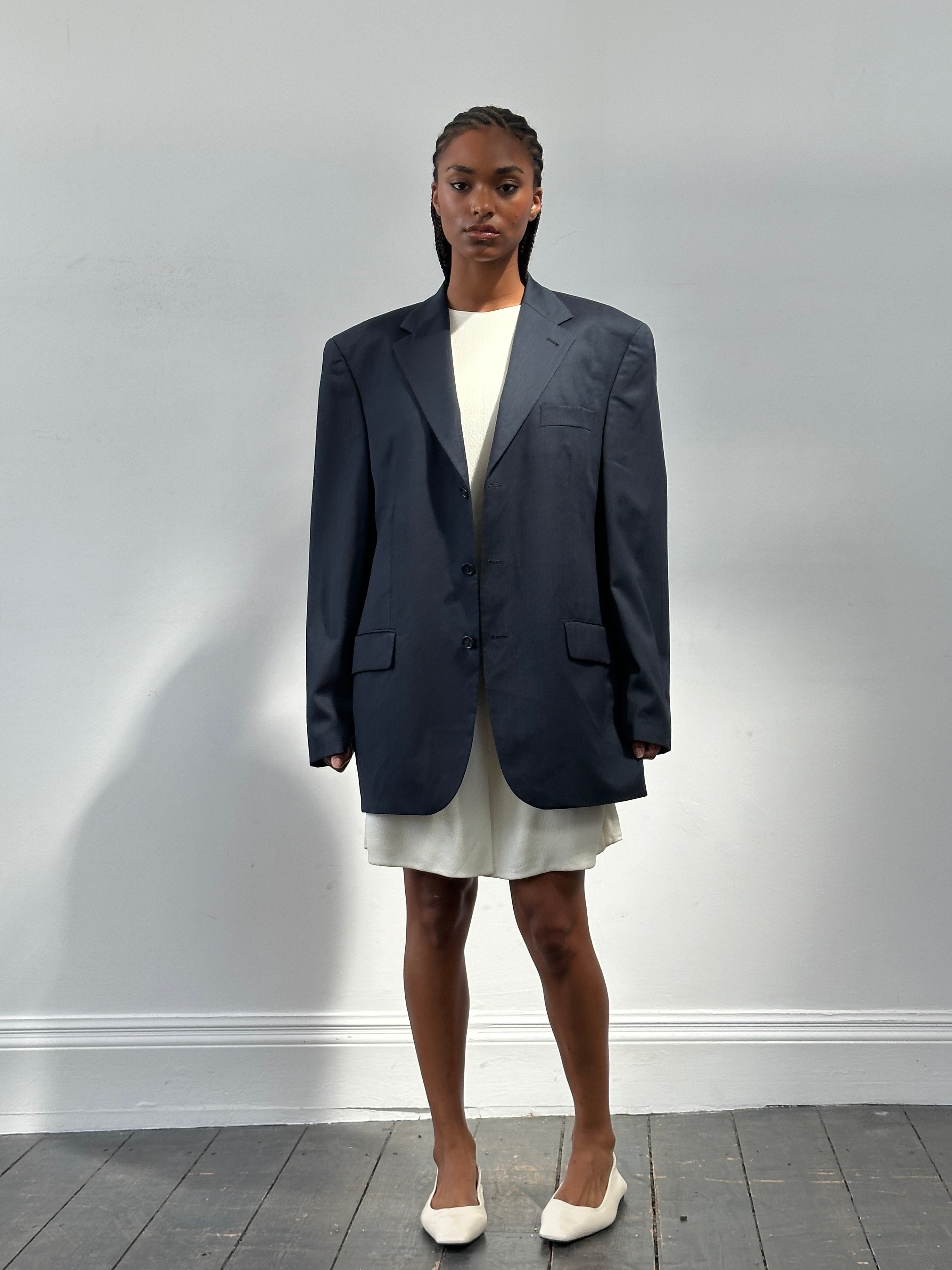 Yves Saint Laurent men's 1990s pure wool single-breasted blazer in size 42R/XL, tailored fit with classic lapel and structured design.