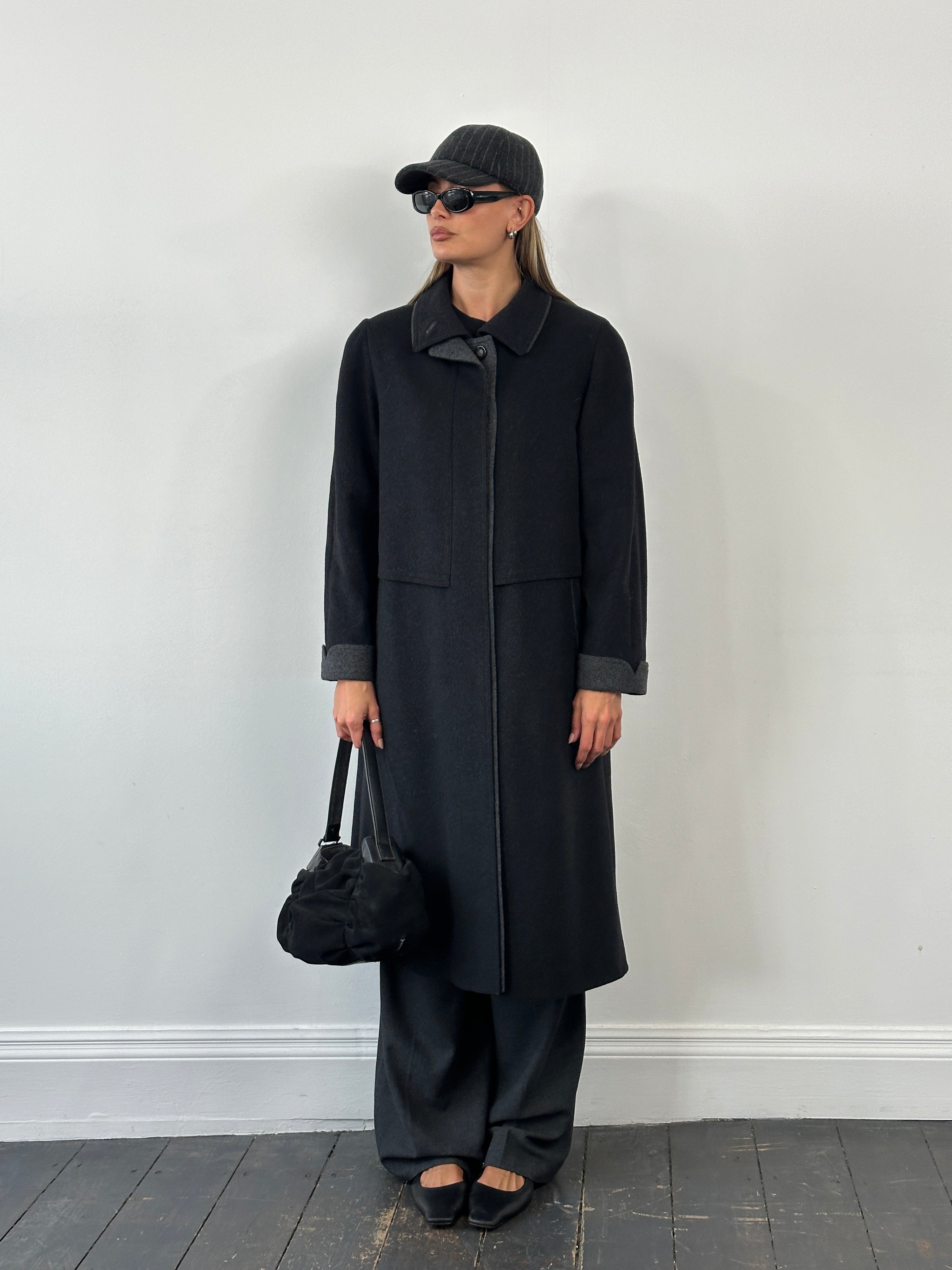 Vintage 1990s wool coat with concealed placket and classic design, size large, featuring a tailored fit and timeless style.