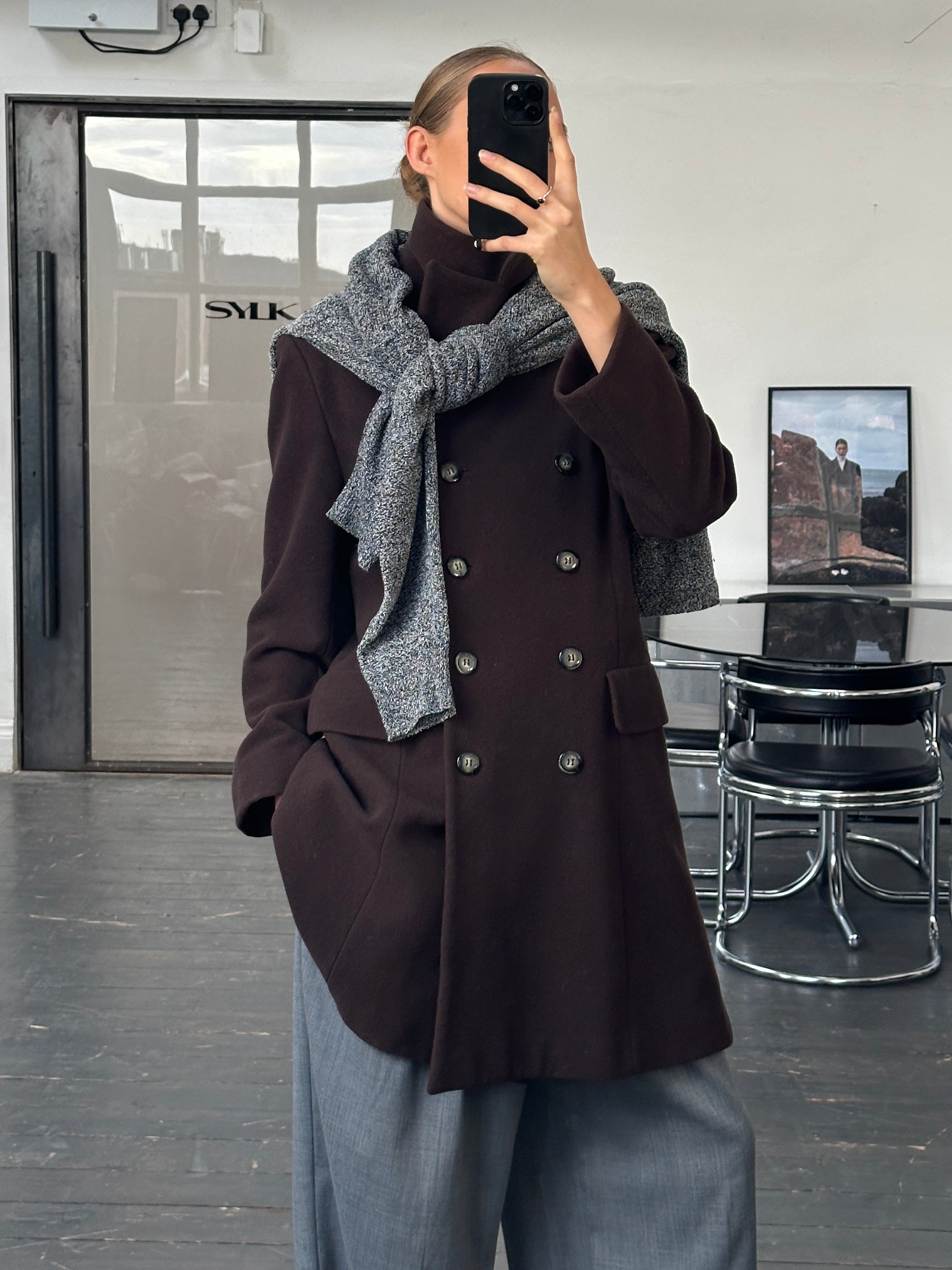 Vintage 1990s wool and cashmere double-breasted coat in size M, featuring classic design and textured fabric.