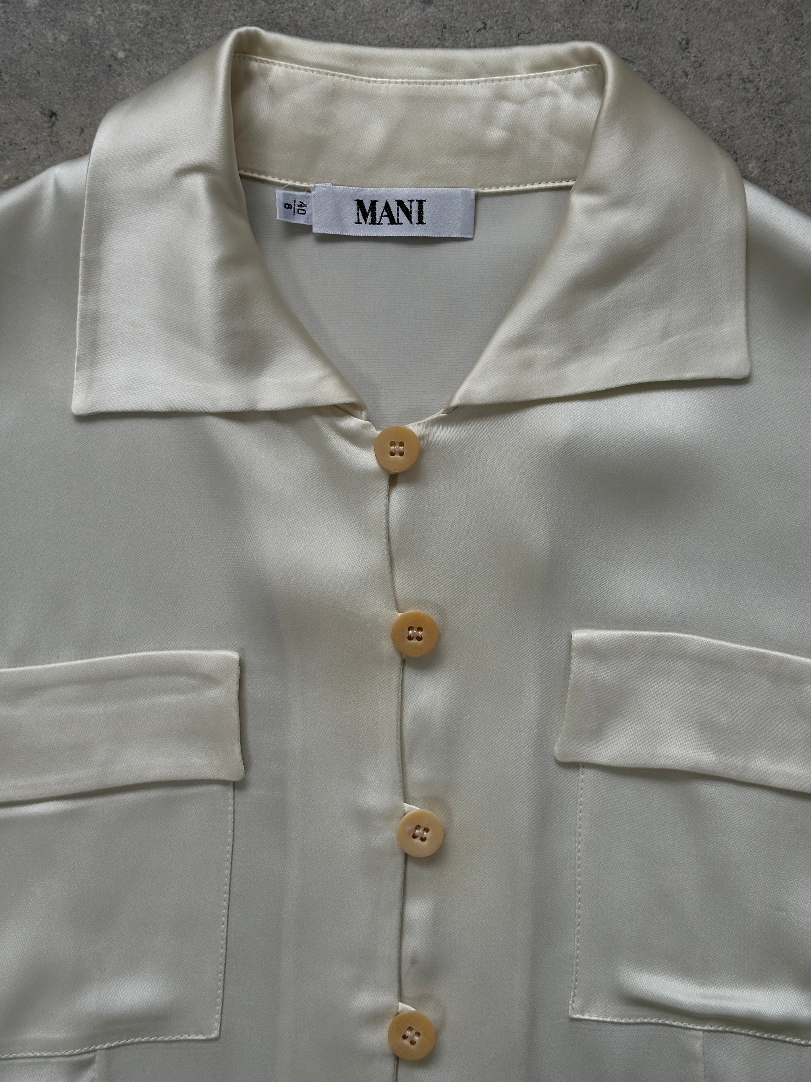 Mani 1990s cropped dress shirt in size S, featuring a classic button-up design and vintage-inspired style.