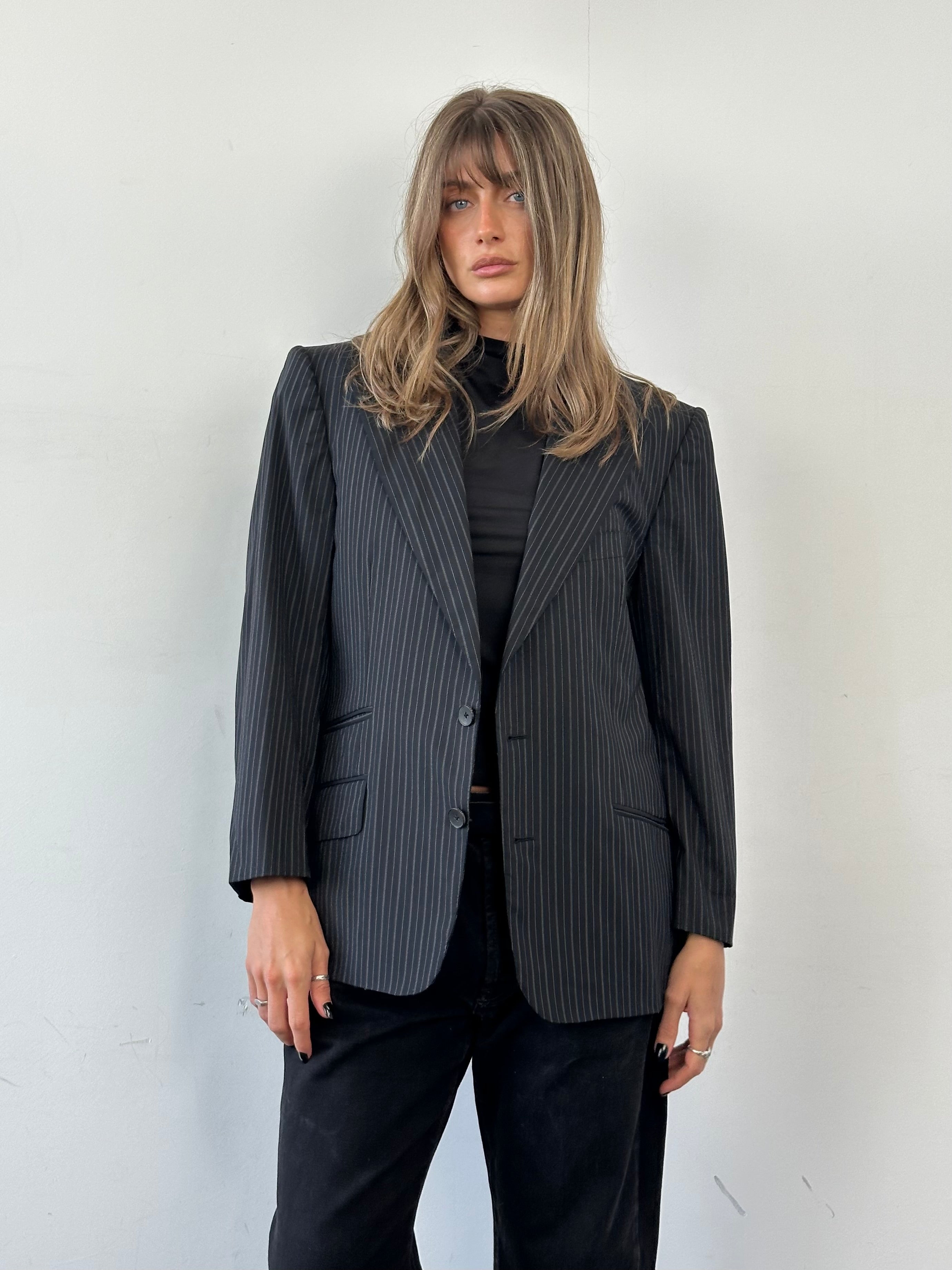 Gucci wool striped dagger collar blazer in size M, featuring tailored fit and classic design with bold stripe pattern.
