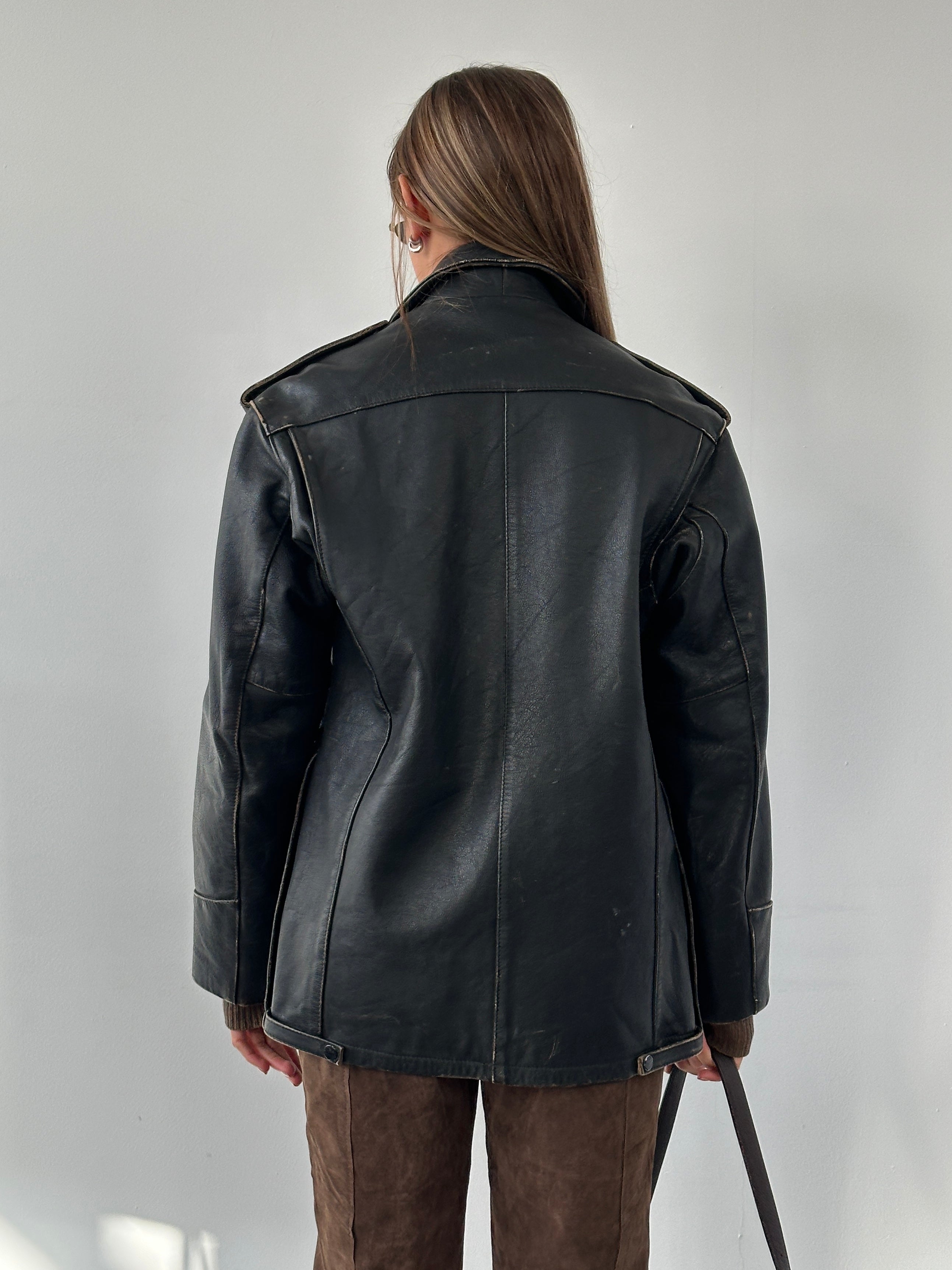 Vintage 1990s aged leather jacket, black with distressed finish, casual fit, featuring classic collar and front zipper.