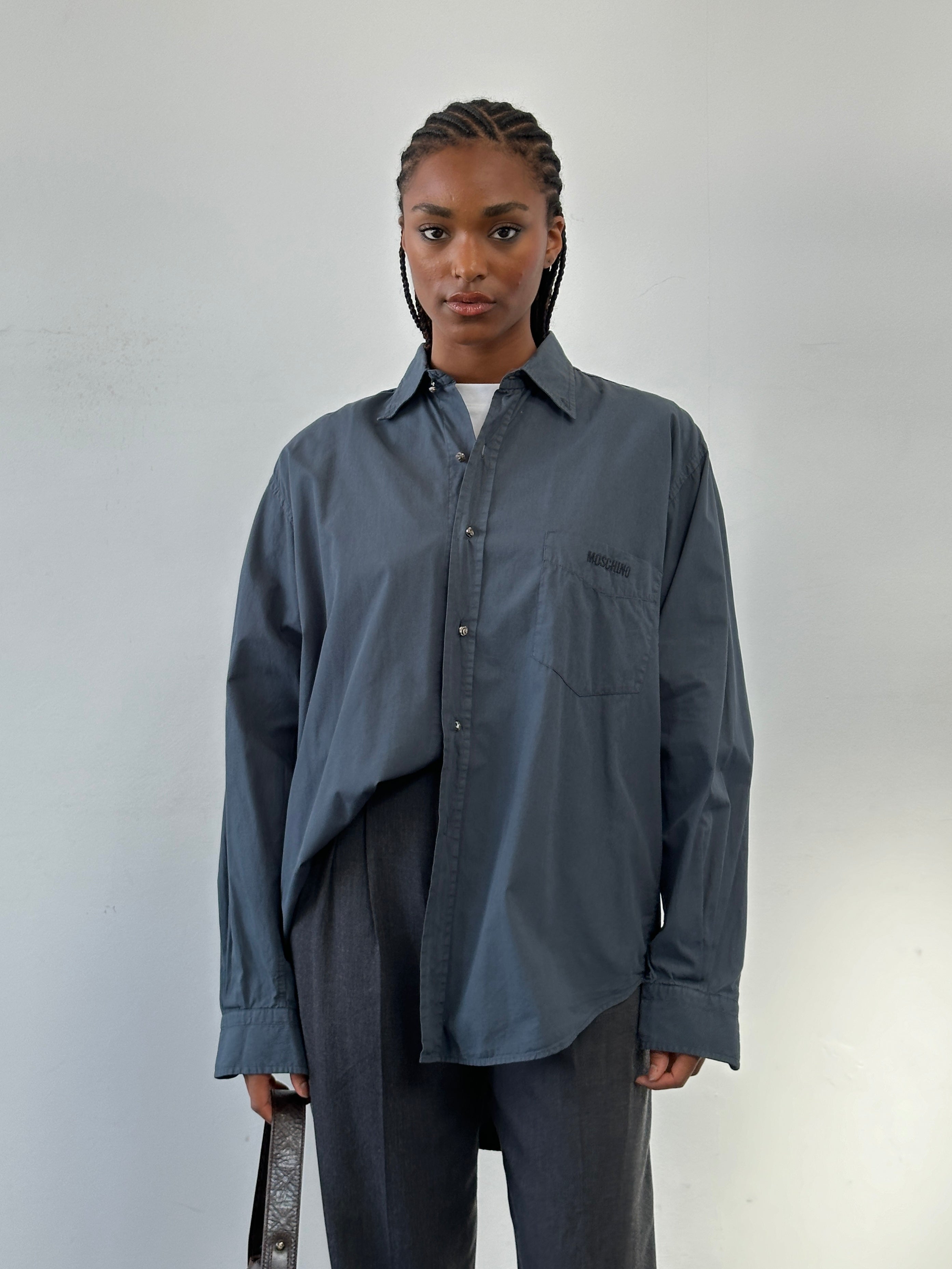 Moschino pure cotton bespoke button logo shirt in size L, featuring a classic collar and front button closure.