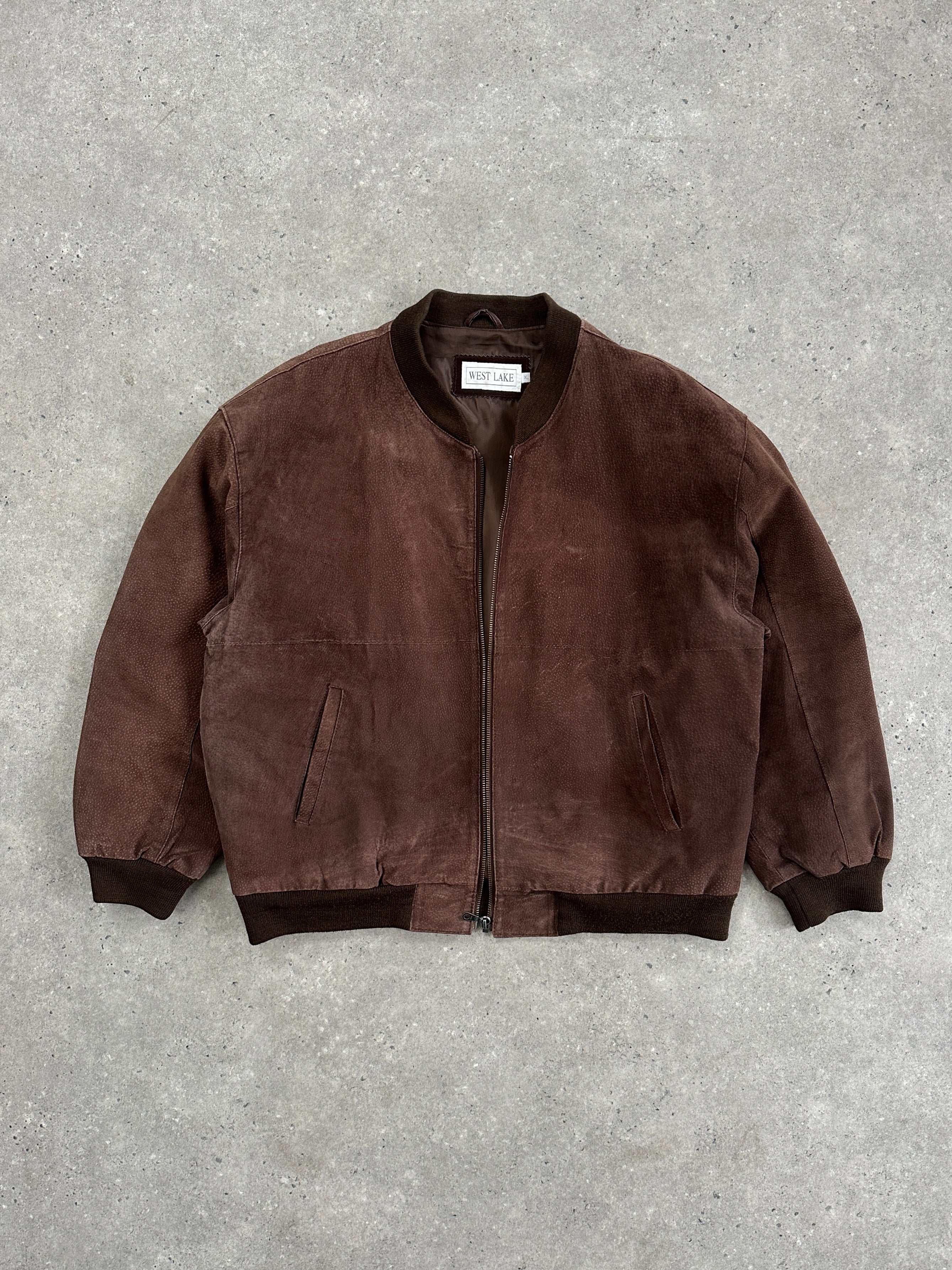 Vintage suede bomber jacket in XL/XXL size with a classic design, featuring a soft textured suede exterior and ribbed collar.