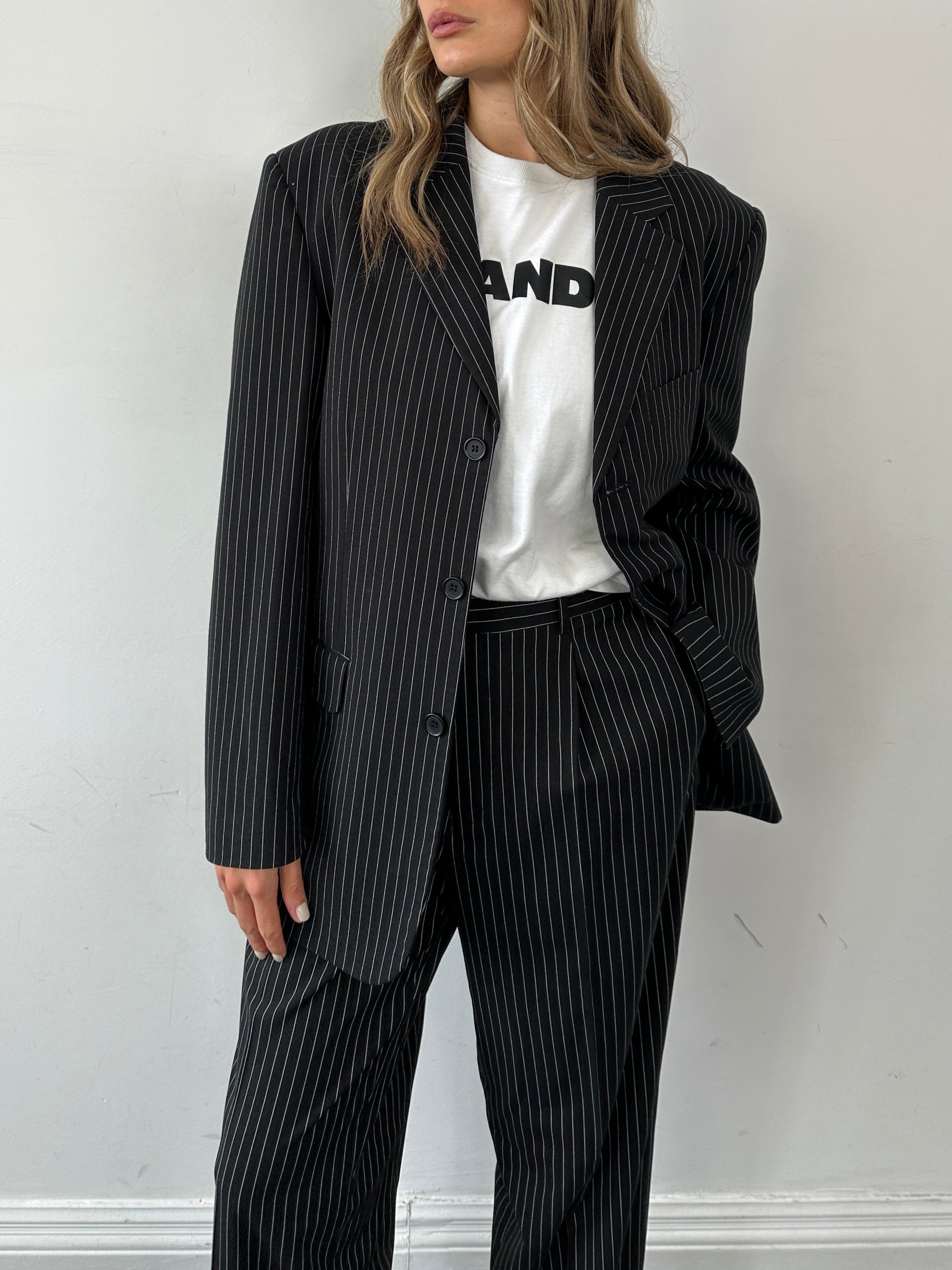 Vintage pinstripe jumpsuit, single-breasted design in size 40R/W36, featuring a classic vintage style and tailored fit.