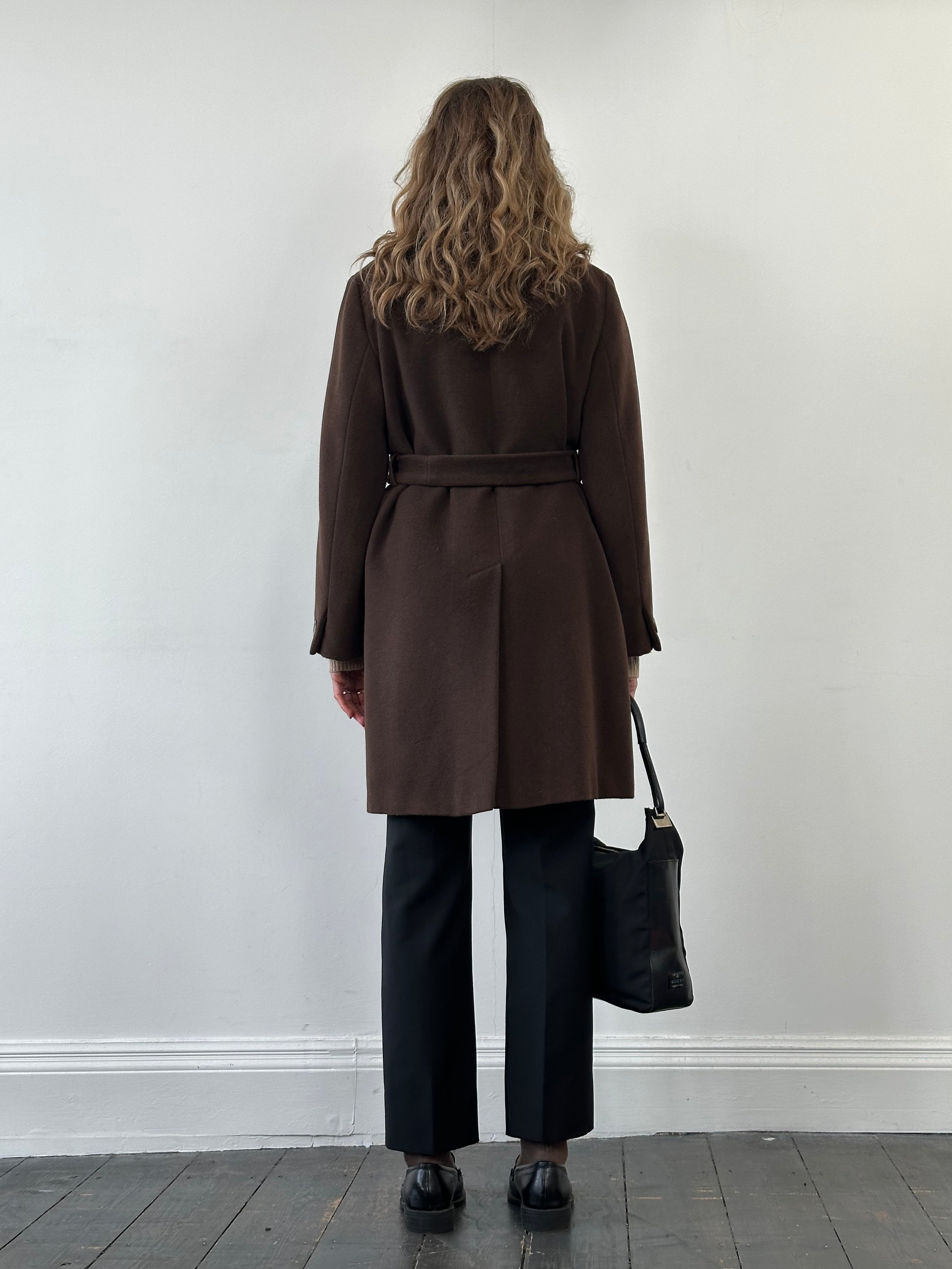Marella Virgin Wool single-breasted belted coat in size M with classic lapel collar and tailored fit, shown on a hanger.
