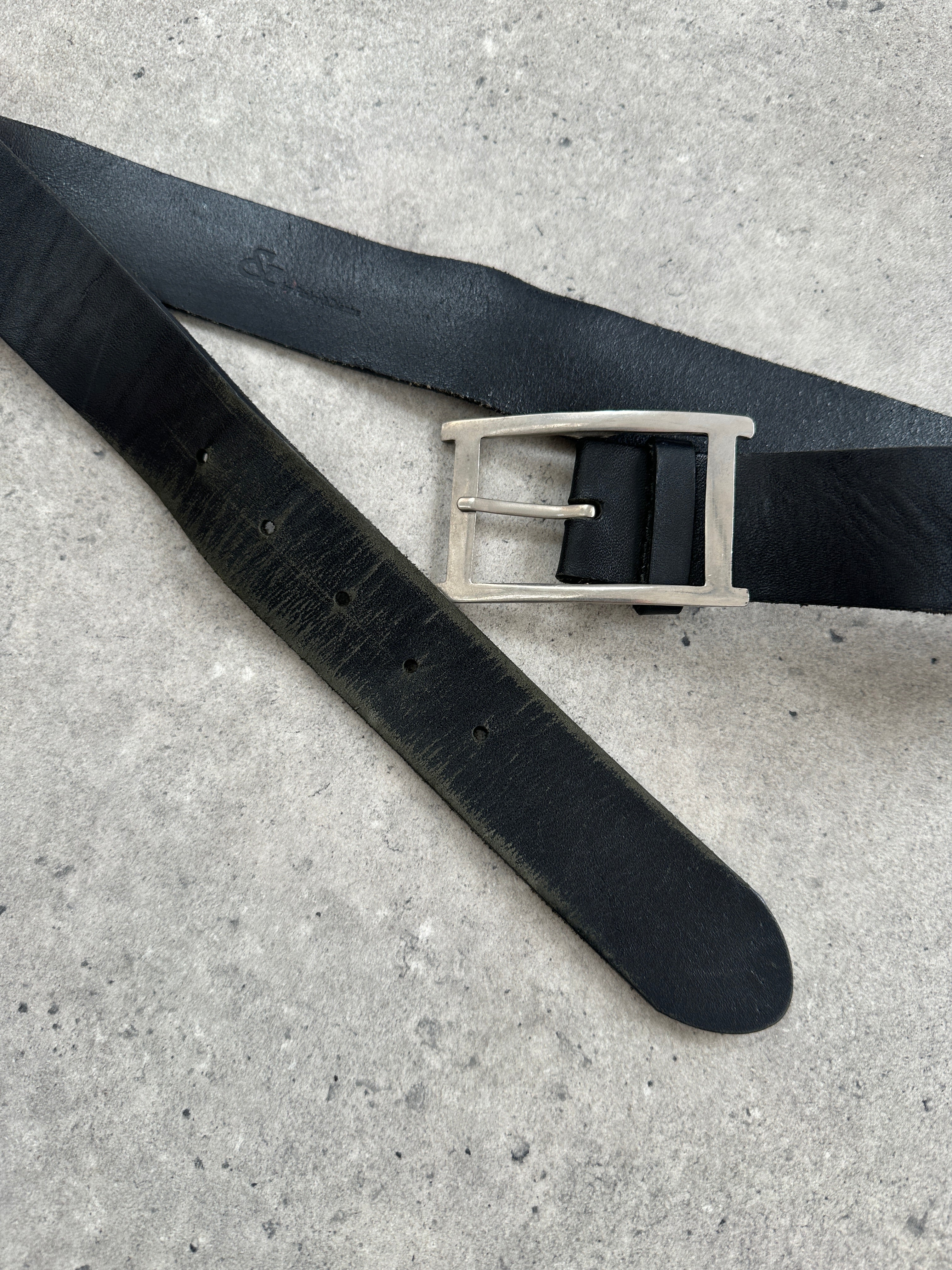 Vintage 2000s chrome leather belt with silver buckle, 30-34 inches, featuring a sleek, shiny finish and classic design.