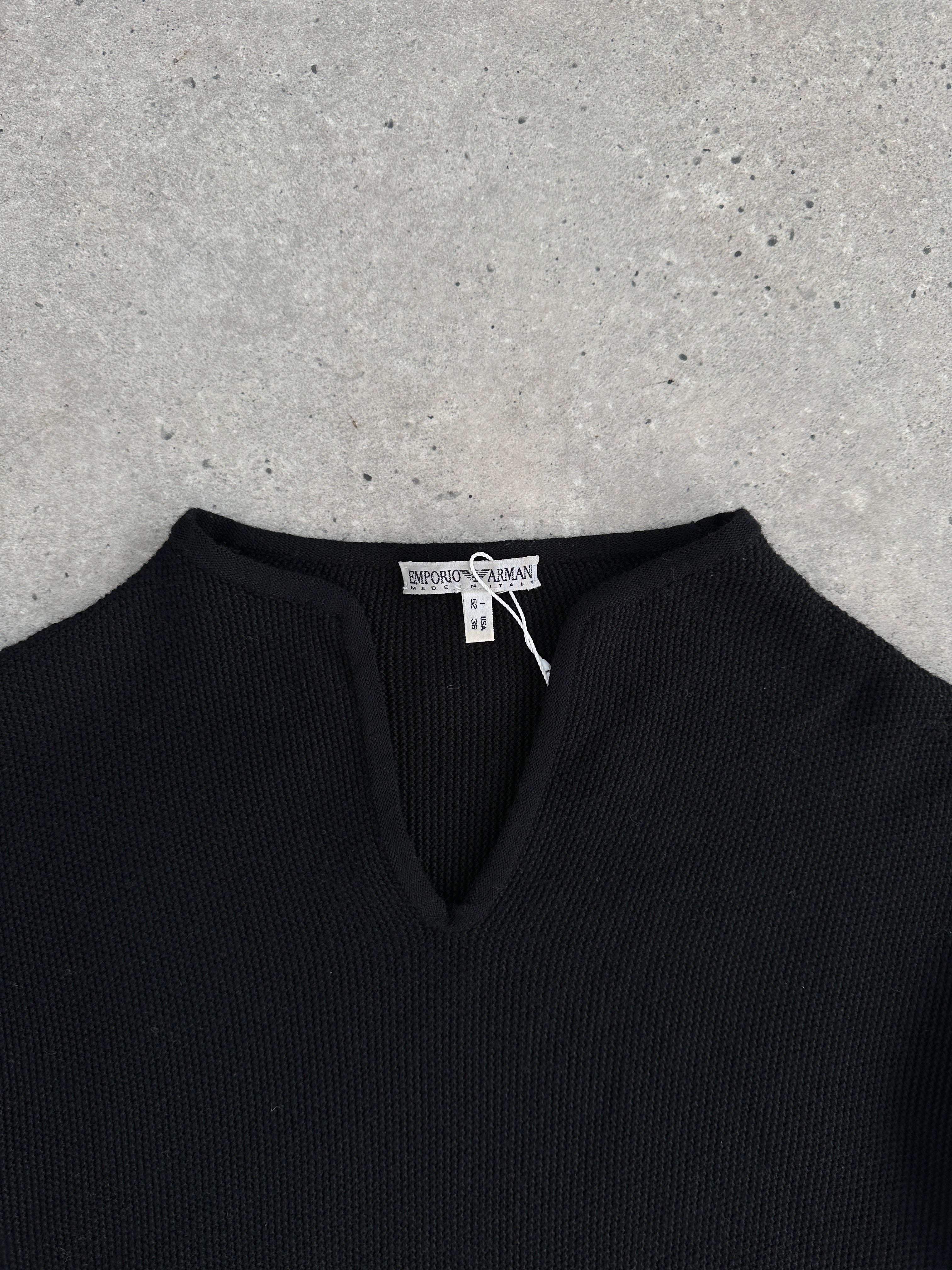 Emporio Armani pure wool knitted jumper in size M/L, featuring a classic design and textured knit pattern.