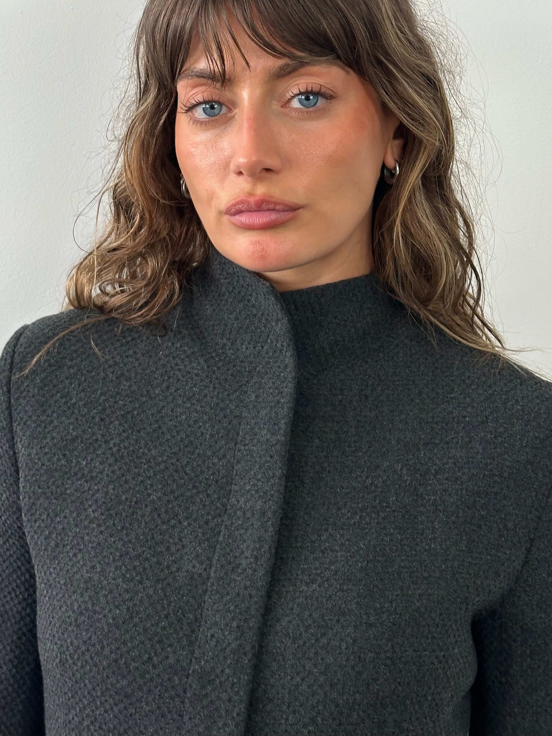 Emporio Armani 1990s high neck minimal jacket in XS/S, showcasing sleek design and tailored fit with neutral color.
