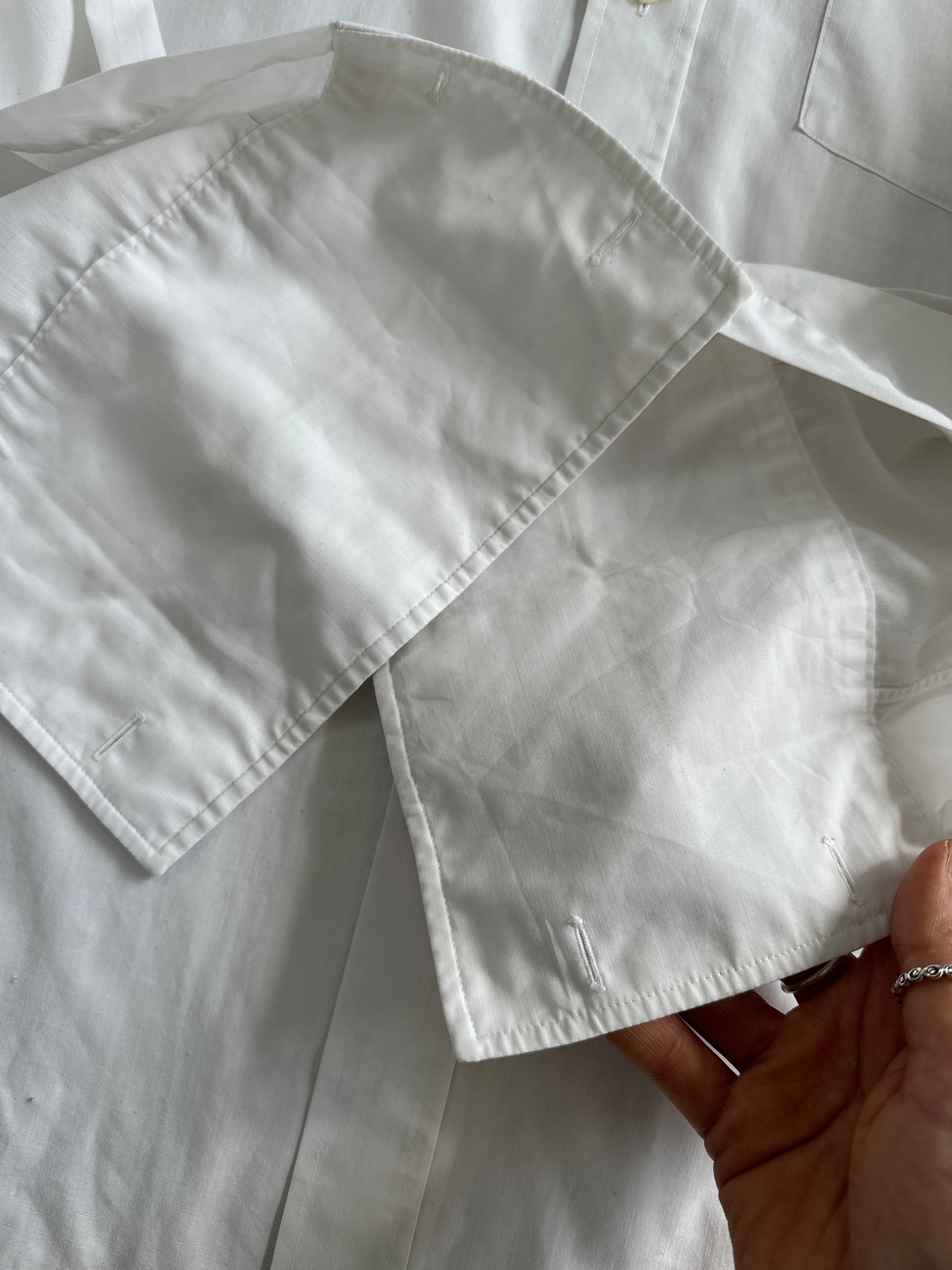 Christian Dior cotton dress shirt in size large, featuring a classic white design with button-down front and tailored fit.