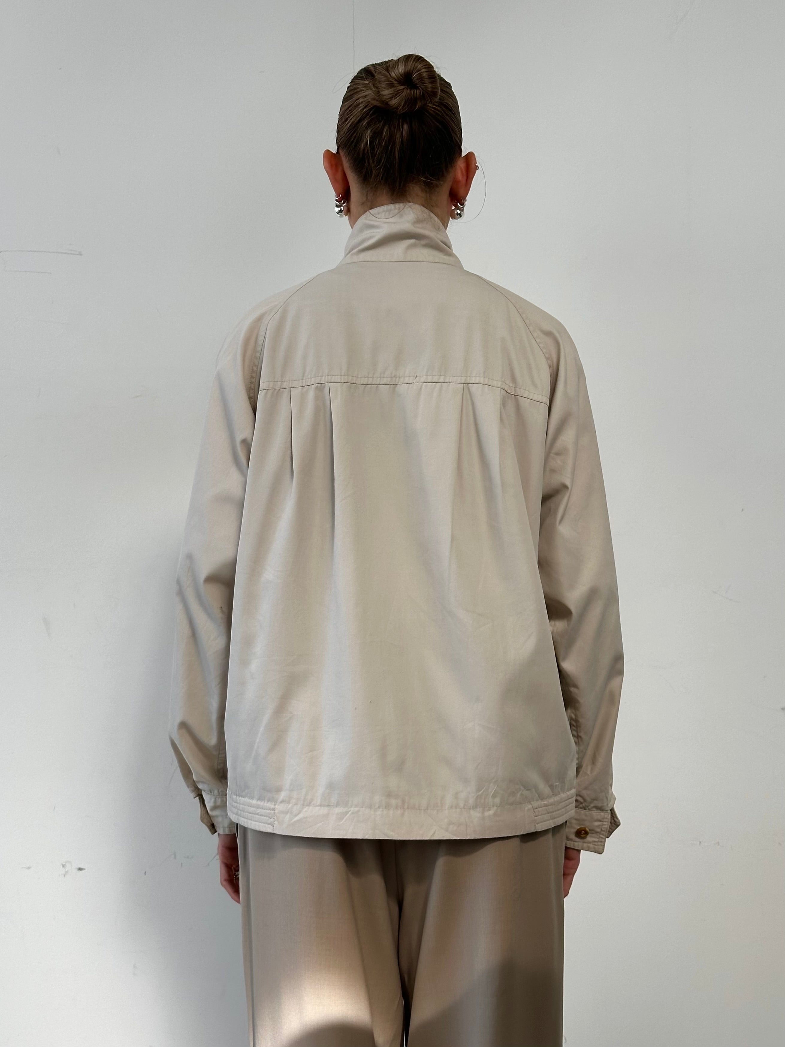 Burberry Nova Check logo bomber jacket in size L, featuring classic check pattern and tailored fit on a model.