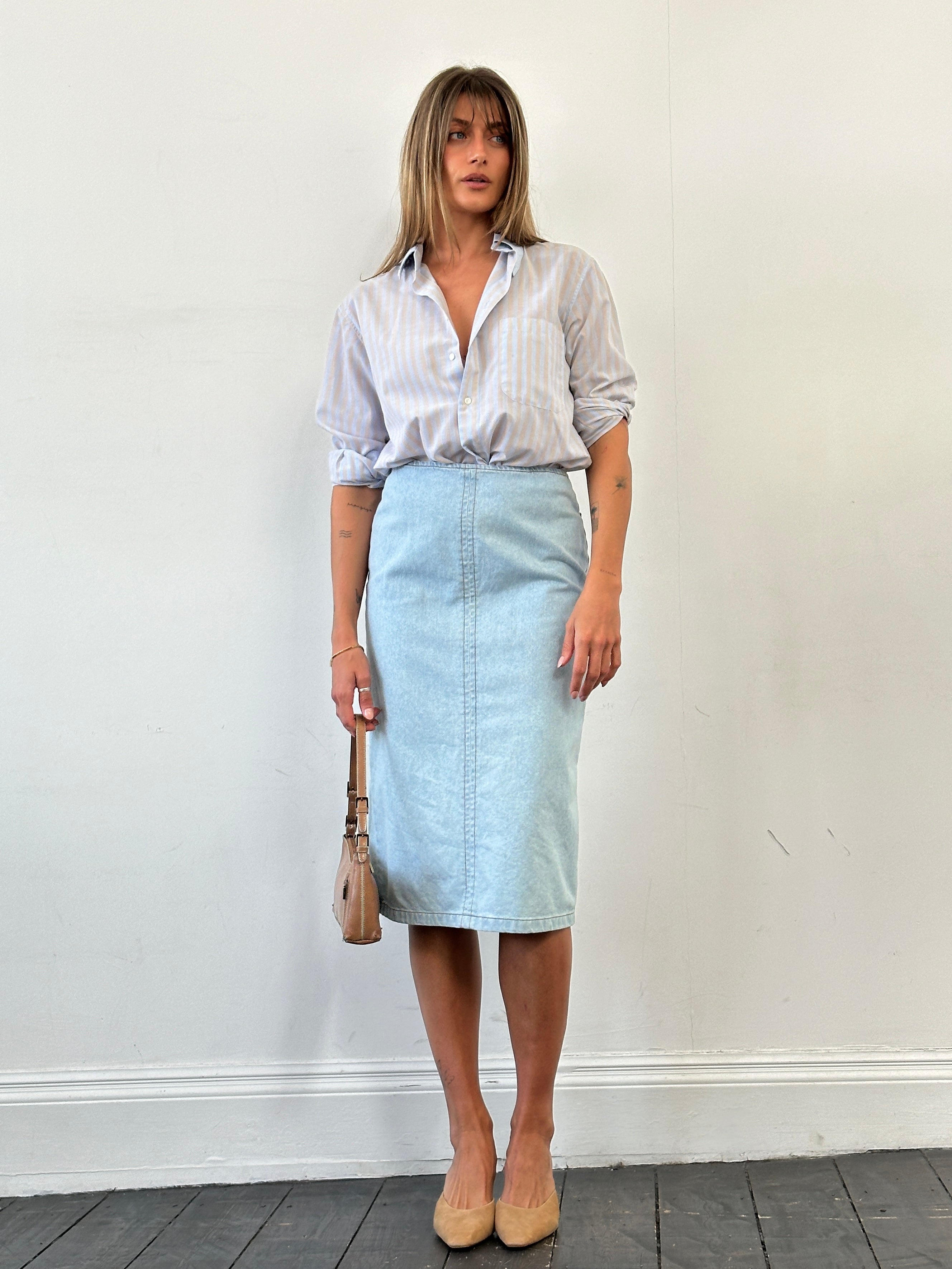 Max Mara pure cotton denim midi skirt, W26, featuring classic design and a flattering fit, displayed on a white background.
