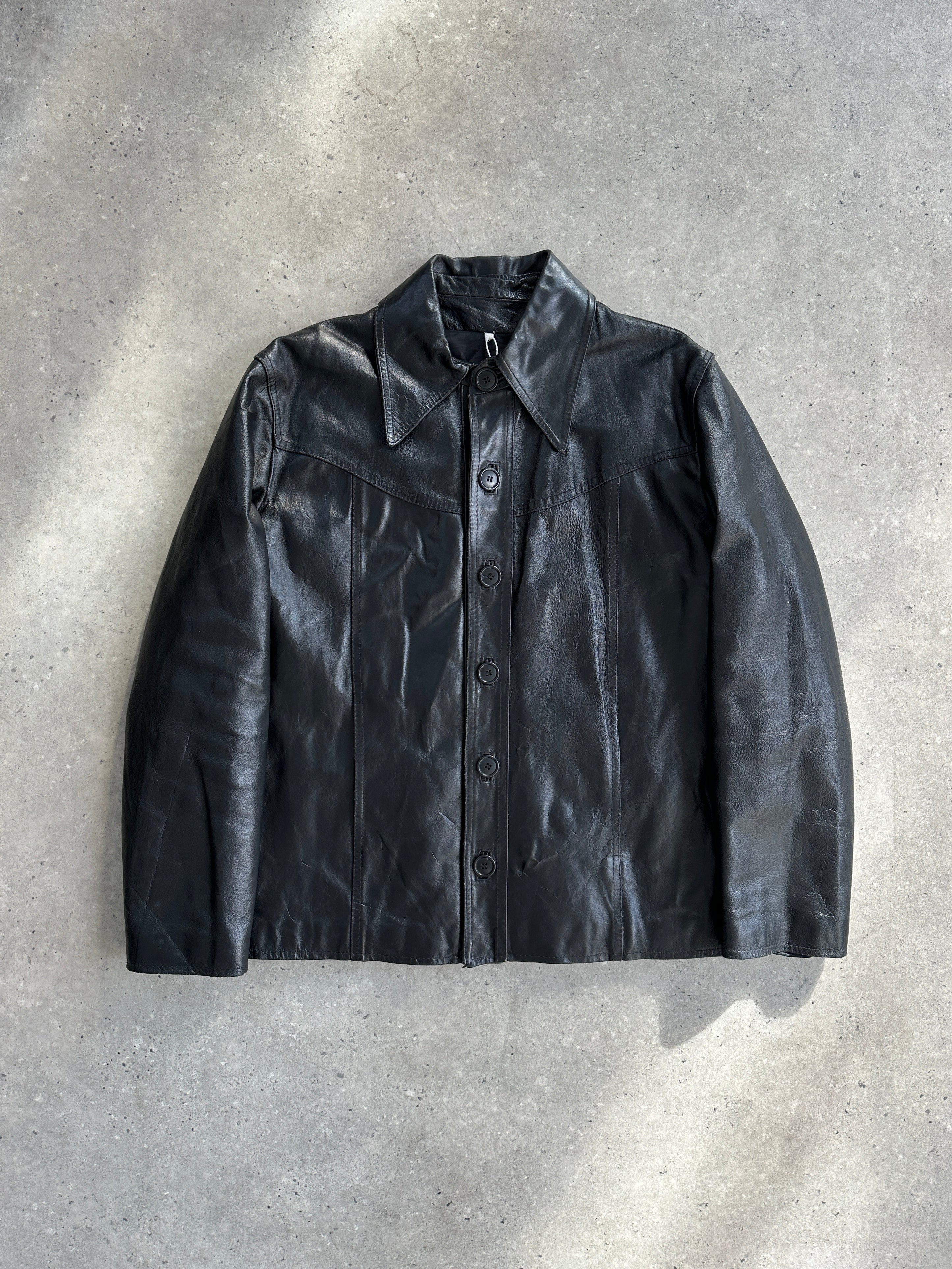 Vintage Italian vintage leather jacket with dagger collar, size large, featuring classic distressed leather and stylish design.